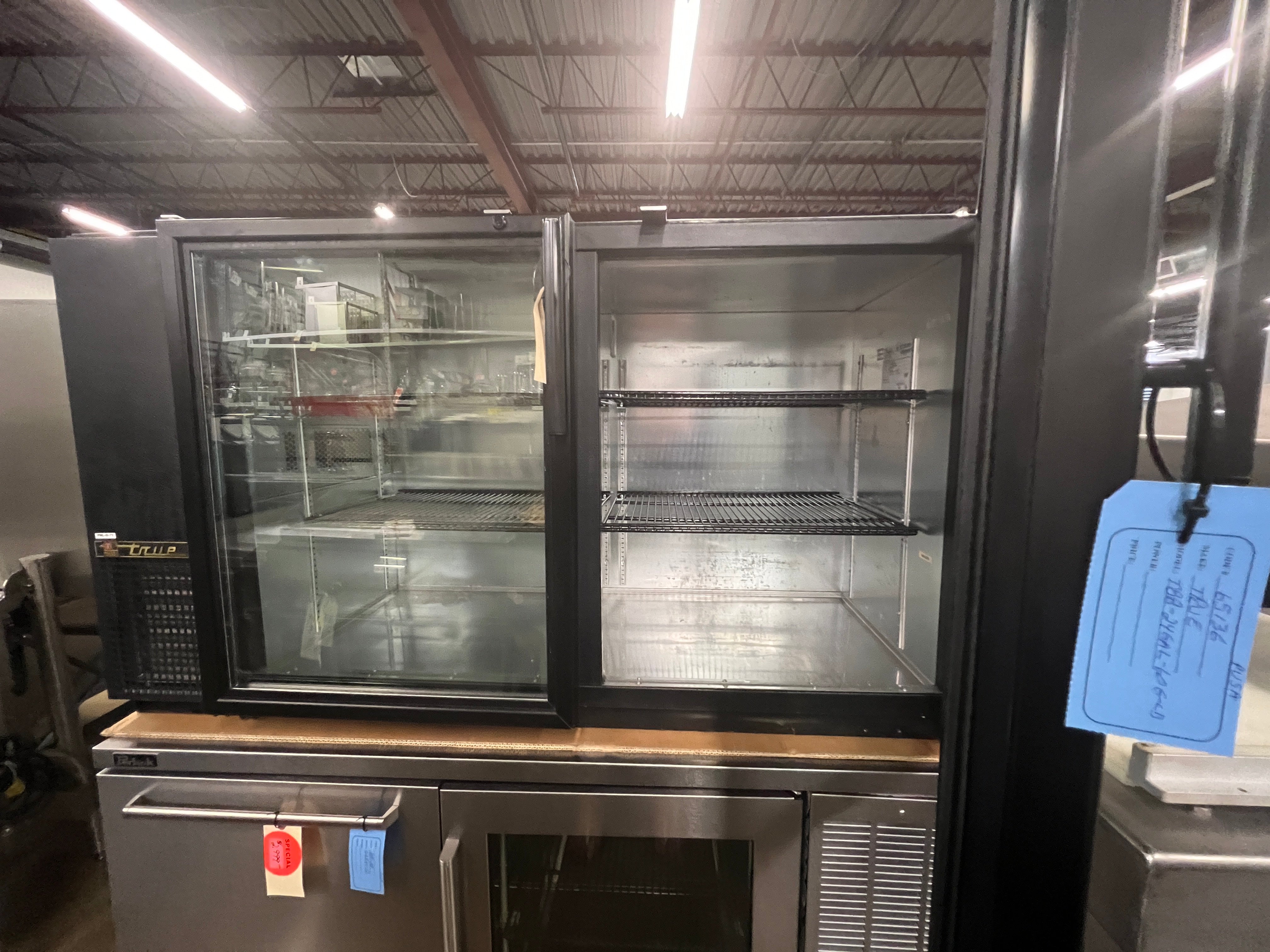 Used True TBB 24 Gallon 60G 60 Glass Door Black Back Bar Refrigerator - Perfect for Bars, Restaurants & Commercial Kitchens