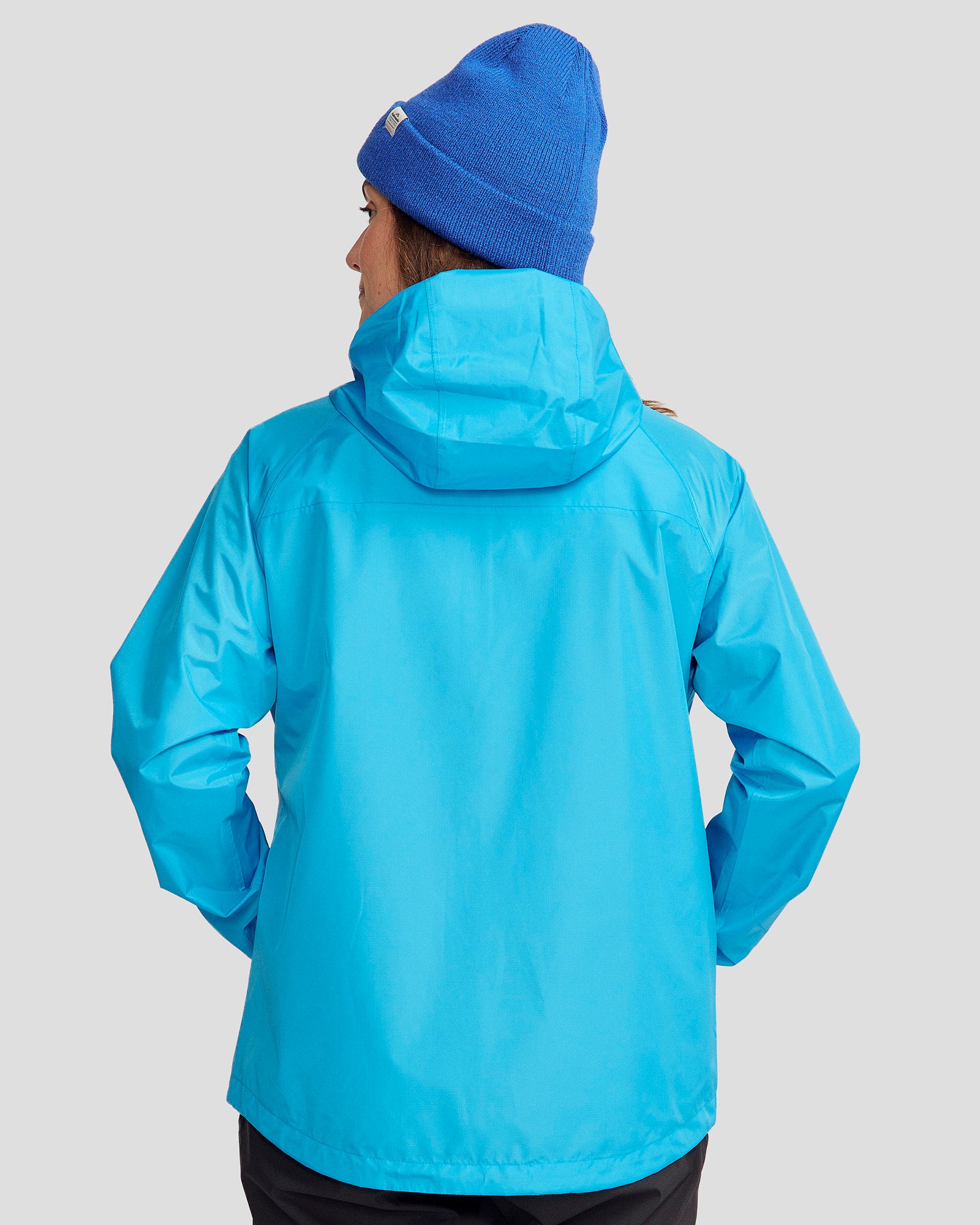 Waterproof Women's 2-Layer Rain Jacket with Pockets - Lightweight & Breathable Windbreaker for Outdoor Activities (Sea Blue) - Perfect for Hiking, Commuting & Travel