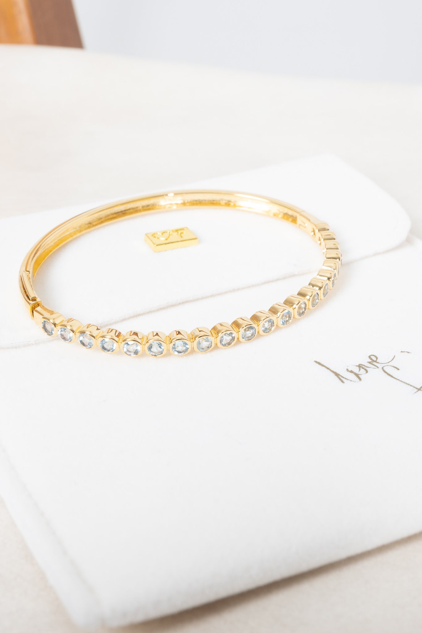 FAIRLEY Blue Topaz Bangle Bracelet - Elegant Sterling Silver Jewelry for Women - Perfect for Weddings, Parties & Special Occasions