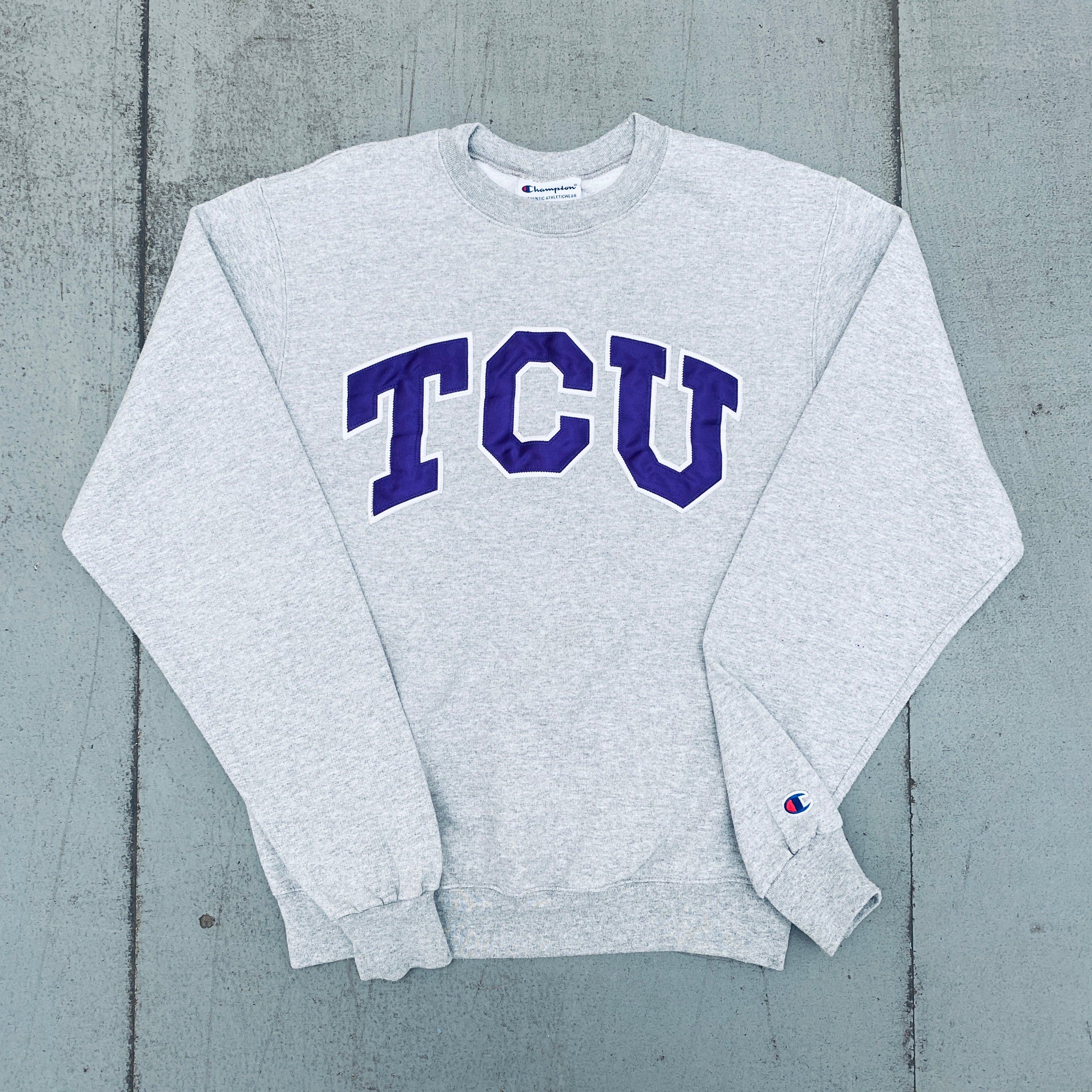 TCU Horned Frogs Vintage 1990s Champion Stitched Spellout Sweatshirt - Retro College Football Fan Apparel for Game Day & Casual Wear