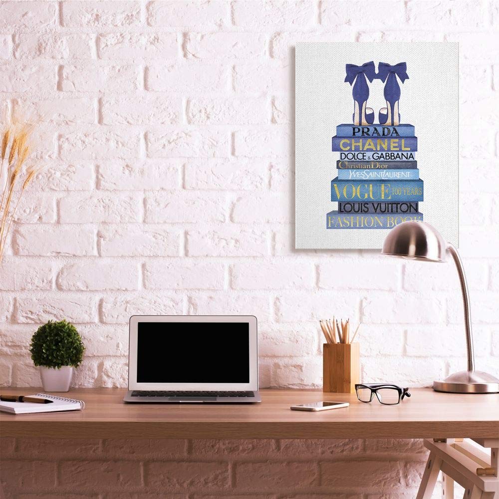 Stupell Industries Blue Bow Heels Above Iconic Designer Books Wall Art - 30x40 Inch Framed Canvas Print, White - Perfect for Living Room, Bedroom & Office Decor