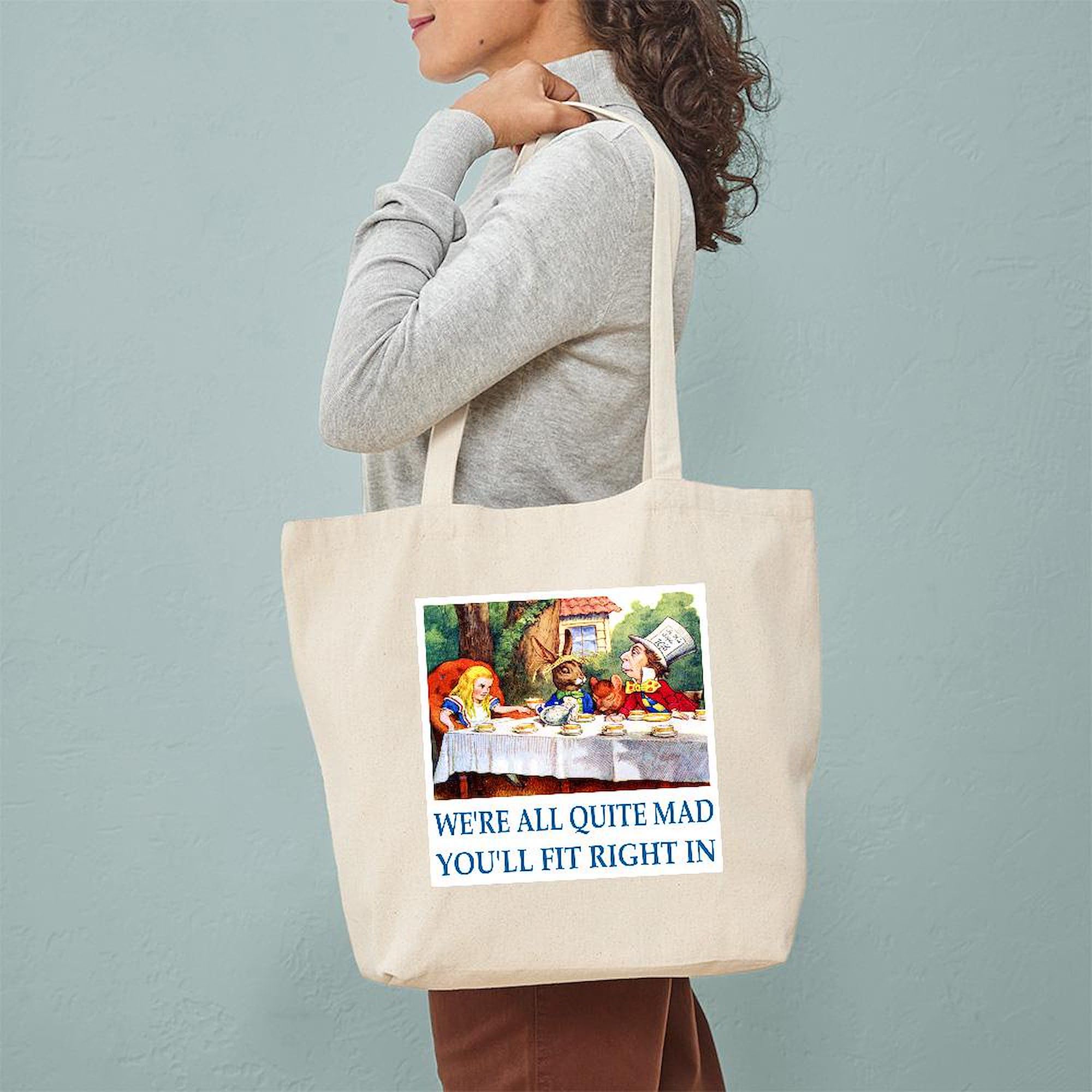 WE're ALL QUITE MAD Natural Canvas Tote Bag - Reusable Eco-Friendly Shopping Bag for Groceries, Beach & Daily Use | CafePress