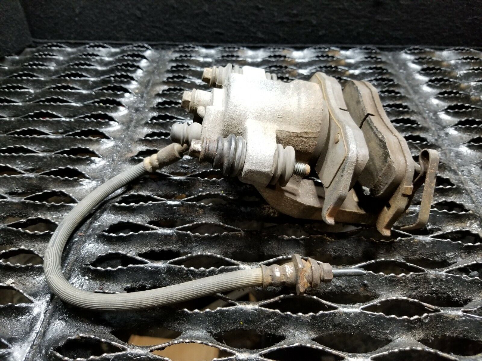 04-07 Infiniti QX56 Rear Left Driver Side Brake Caliper - OEM Replacement Part - Perfect for Brake System Repair & Maintenance