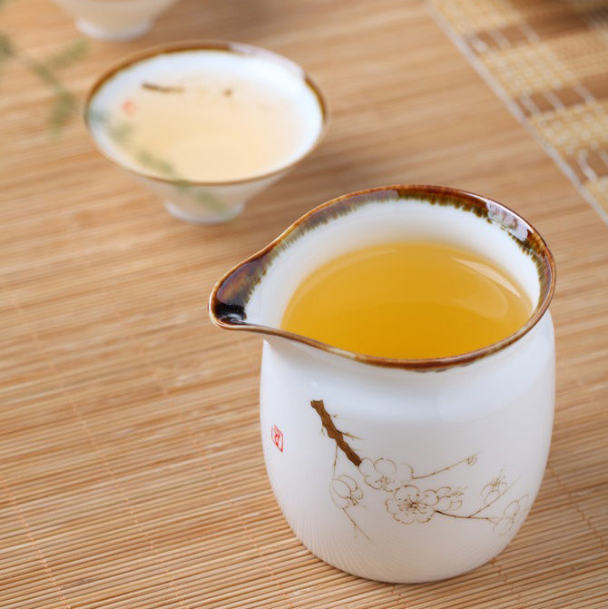 White Porcelain Lotus Fair Cup - Elegant Tea Cup for Chinese Tea Ceremony, Perfect for Home, Office, and Gifts - Handcrafted Ceramic Tea Set for Relaxation and Meditation