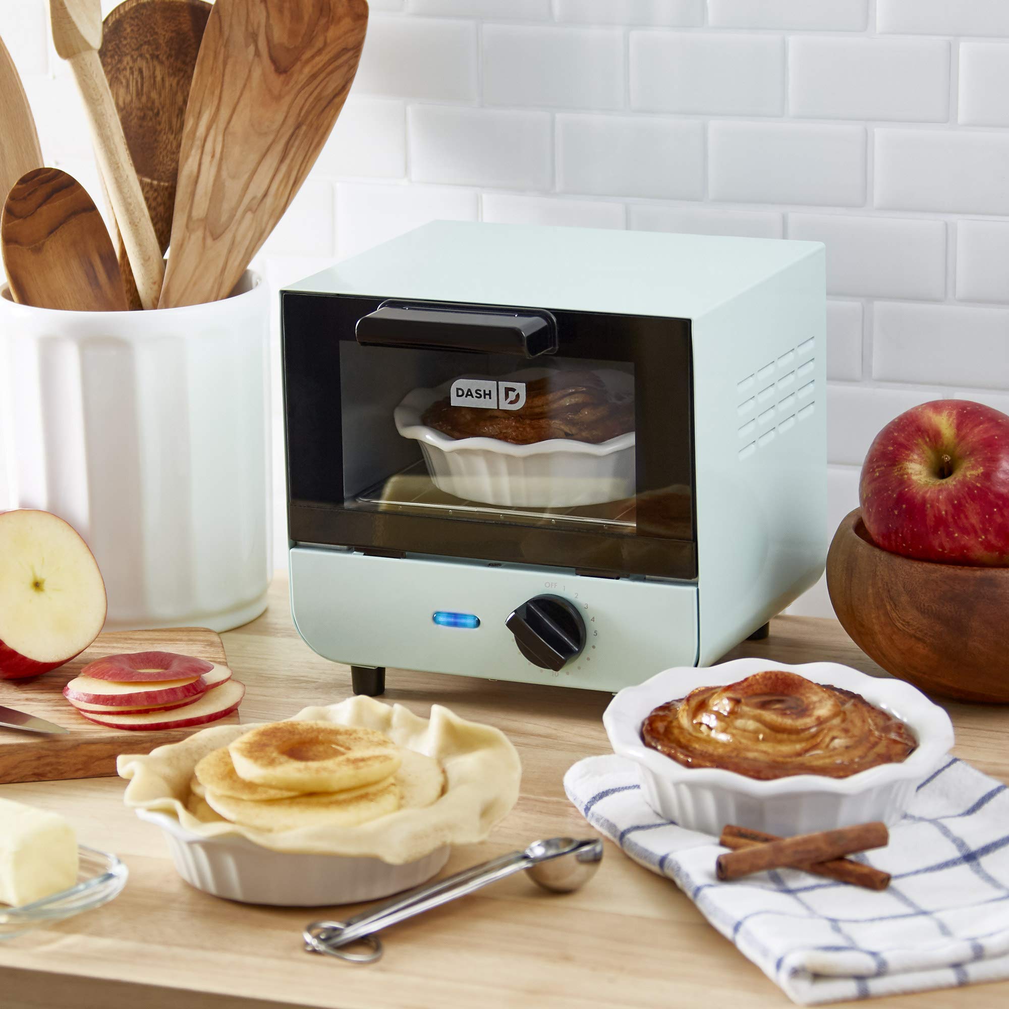 Dash DMTO100GBAQ04 Mini Toaster Oven Cooker - 4-Slice Countertop Toaster for Bread, Bagels, Sandwiches | Portable Grill & Panini Press Machine for Burgers, Chicken & Breakfast | Perfect for Small Kitchens, Dorms, RVs & On-the-Go Cooking (Aqua)