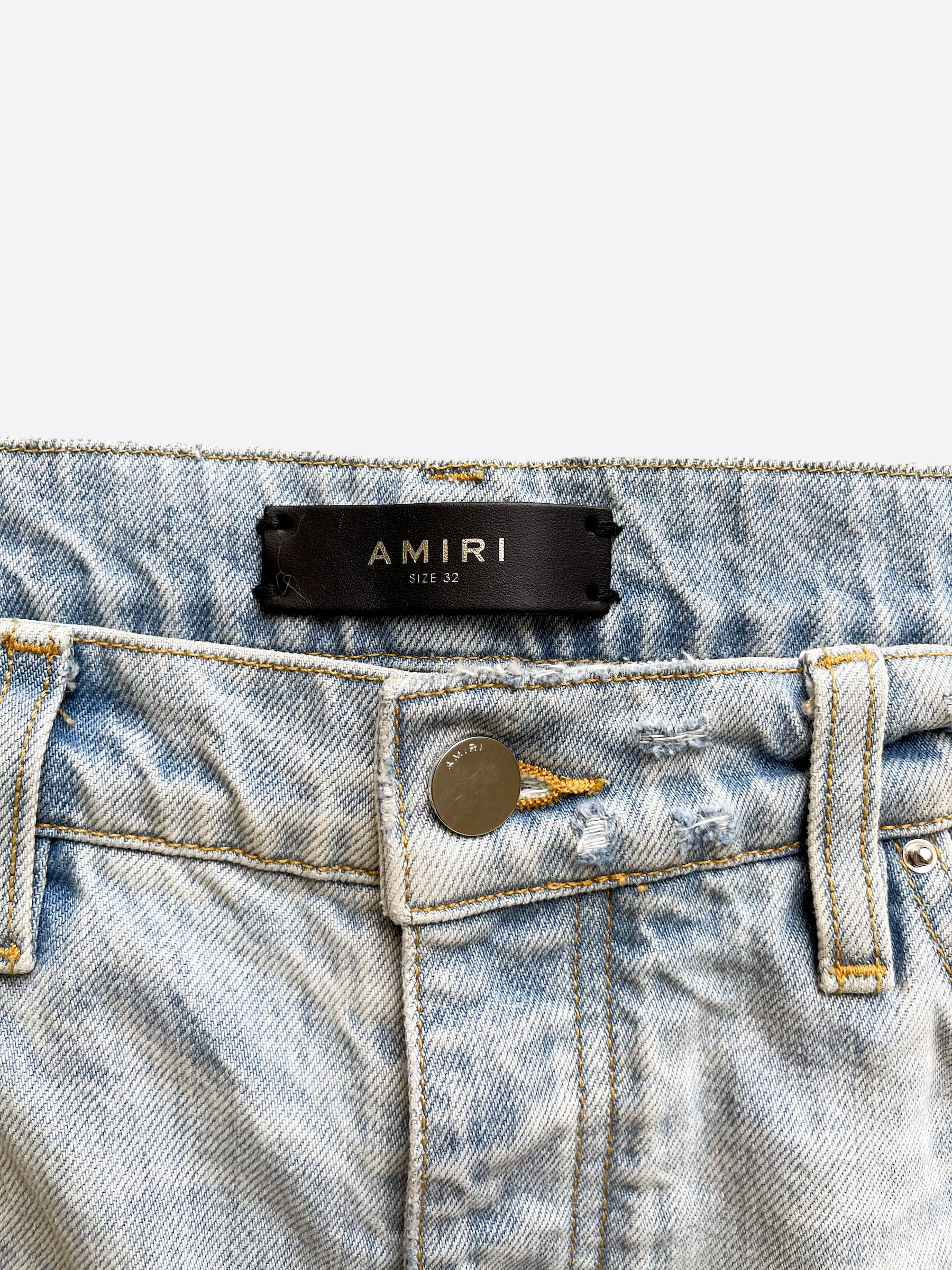 Amiri Light Blue Distressed Jeans for Men - Vintage Washed Slim Fit Denim Pants | Perfect for Casual Wear, Street Style & Night Out