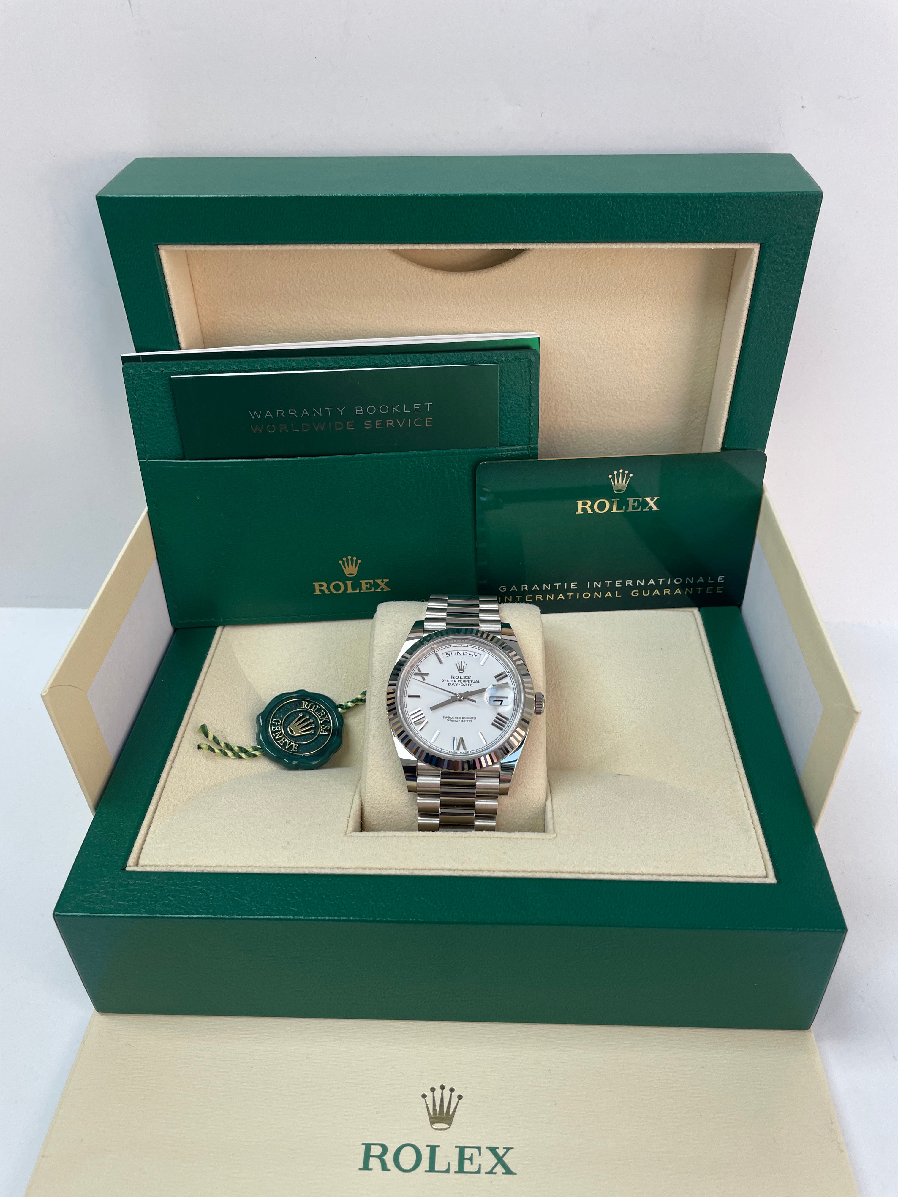 Rolex Day-Date 40mm 18K White Gold Watch with White Roman Dial, Fluted Bezel & President Bracelet (Ref. 228239) - Luxury Dress Watch for Business & Formal Occasions