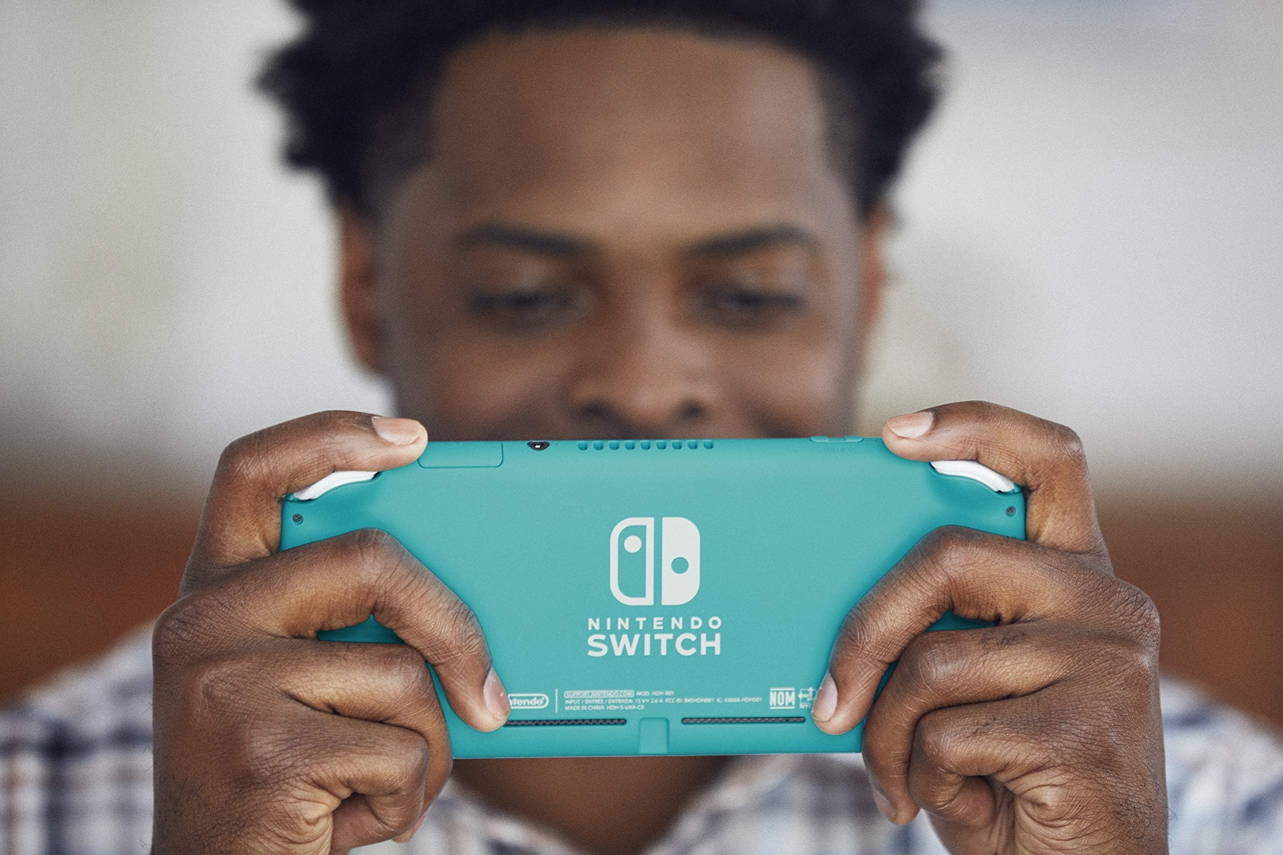 Nintendo Switch Lite - Turquoise Portable Gaming Console | Handheld Video Game System for Kids & Adults | Perfect for Travel, Commuting & On-the-Go Gaming