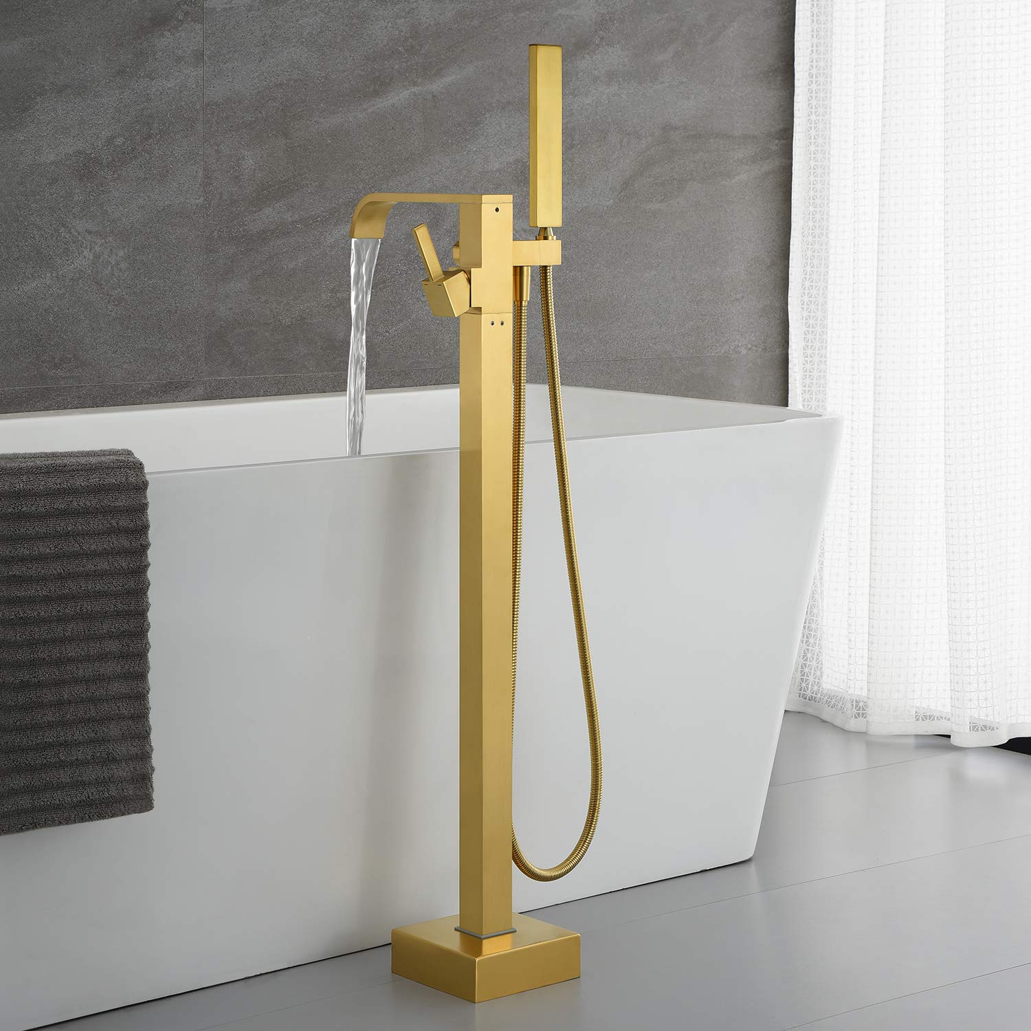 Freestanding Bathtub Faucet - Brushed Gold Floor Mount Tub Filler with Single Handle & Hand Shower - Solid Brass Construction for Modern Bathrooms | Perfect for Spa-Like Relaxation and Luxury Bathing Experience