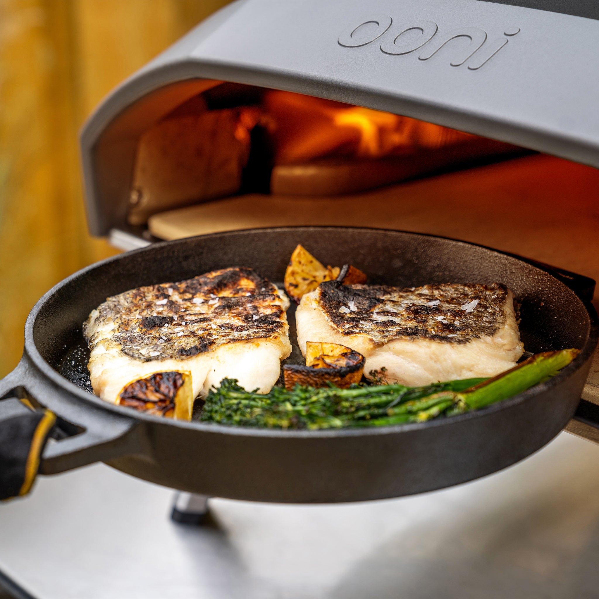Premium Ooni Cast Iron Skillet Pan - 12 Inch Pre-Seasoned Outdoor Pizza & Cooking Pan for Grill, Campfire, Stovetop - Perfect for Pizza, Steak, Vegetables & More