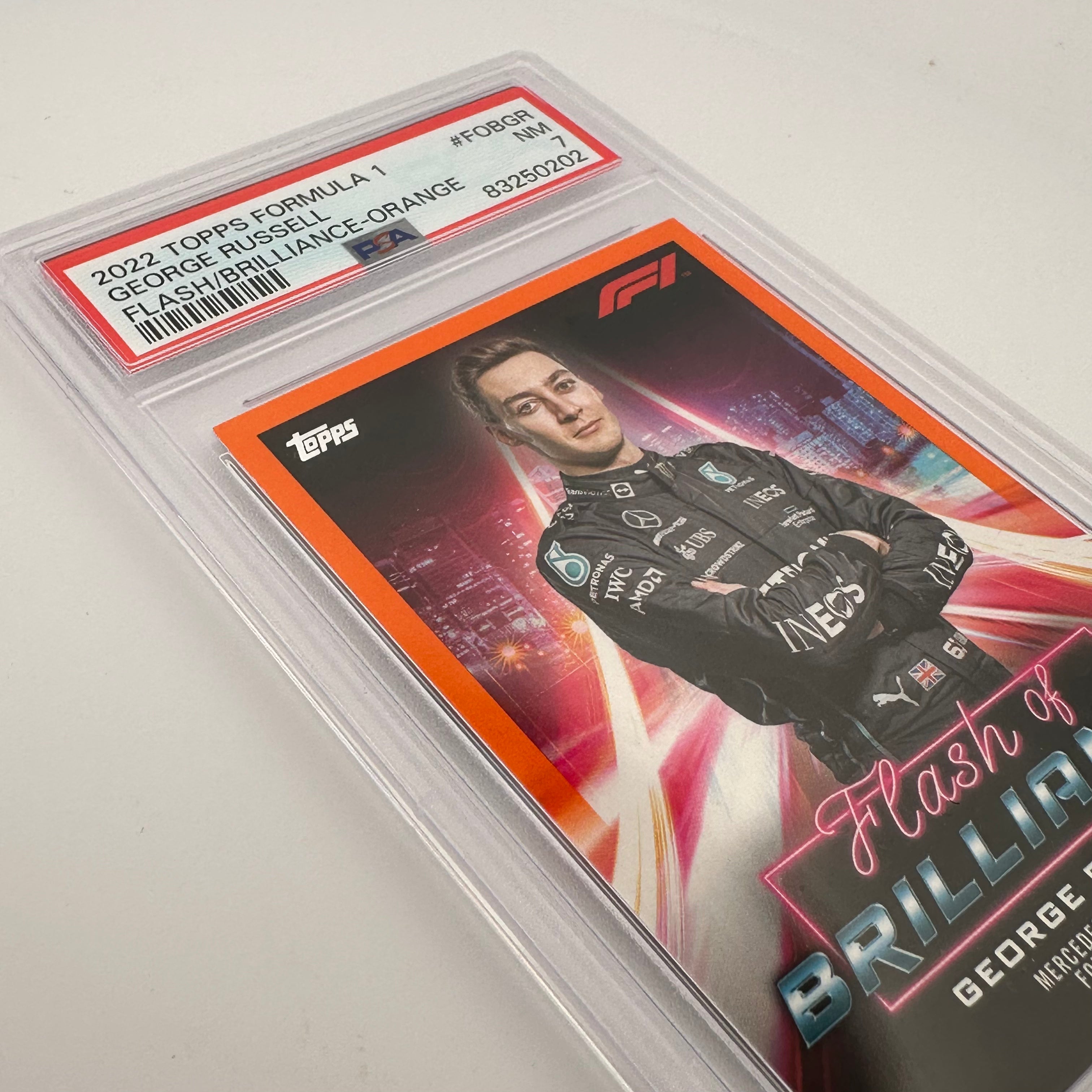 PSA 7 George Russell #FOBGR Flash Of Brilliance Orange Trading Card - Perfect for Sports Collectors, Investors & Memorabilia Enthusiasts
