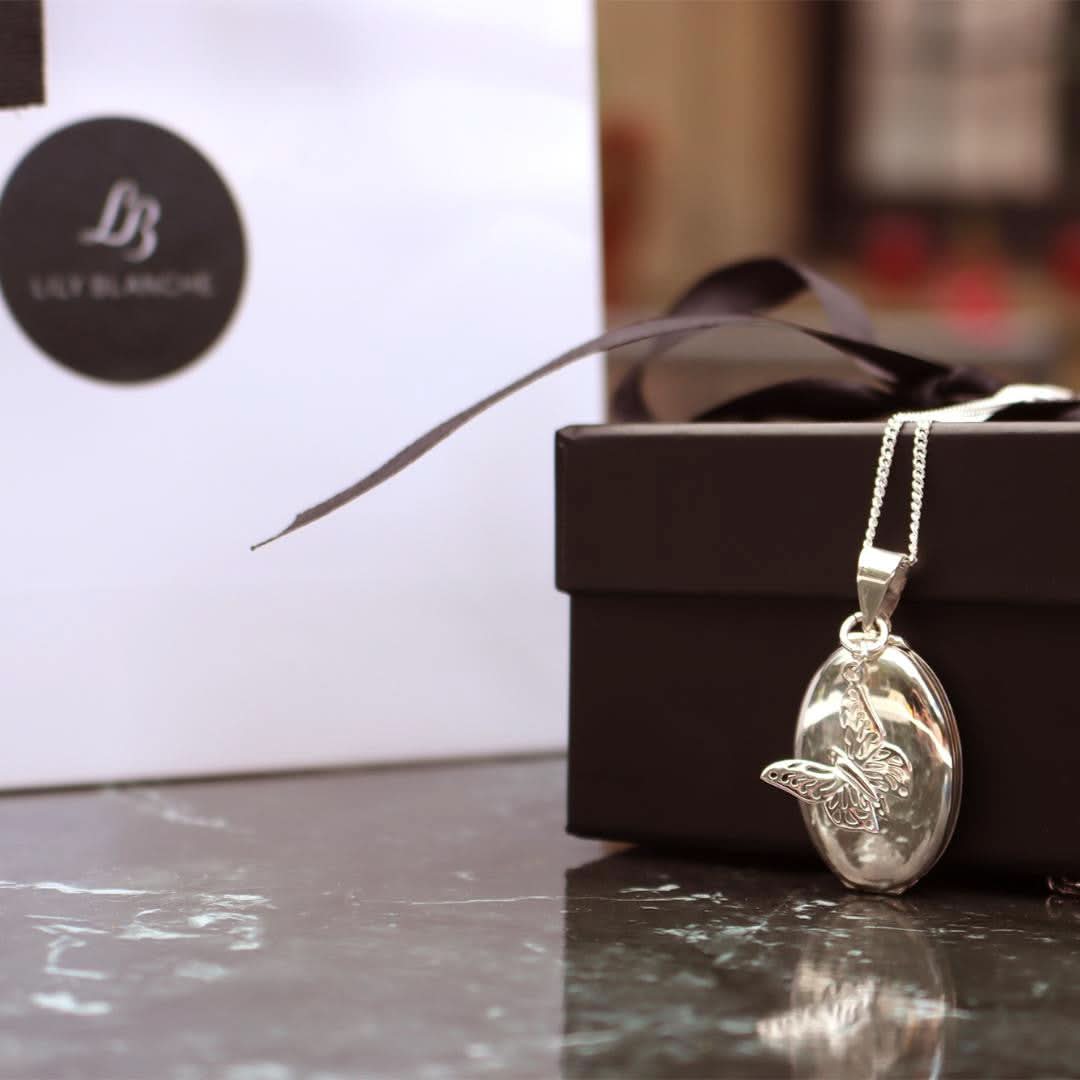 Four Photo Oval Butterfly Locket Necklace in Sterling Silver - Perfect for Valentine's Day Gifts, Anniversary Presents & Keepsake Jewelry