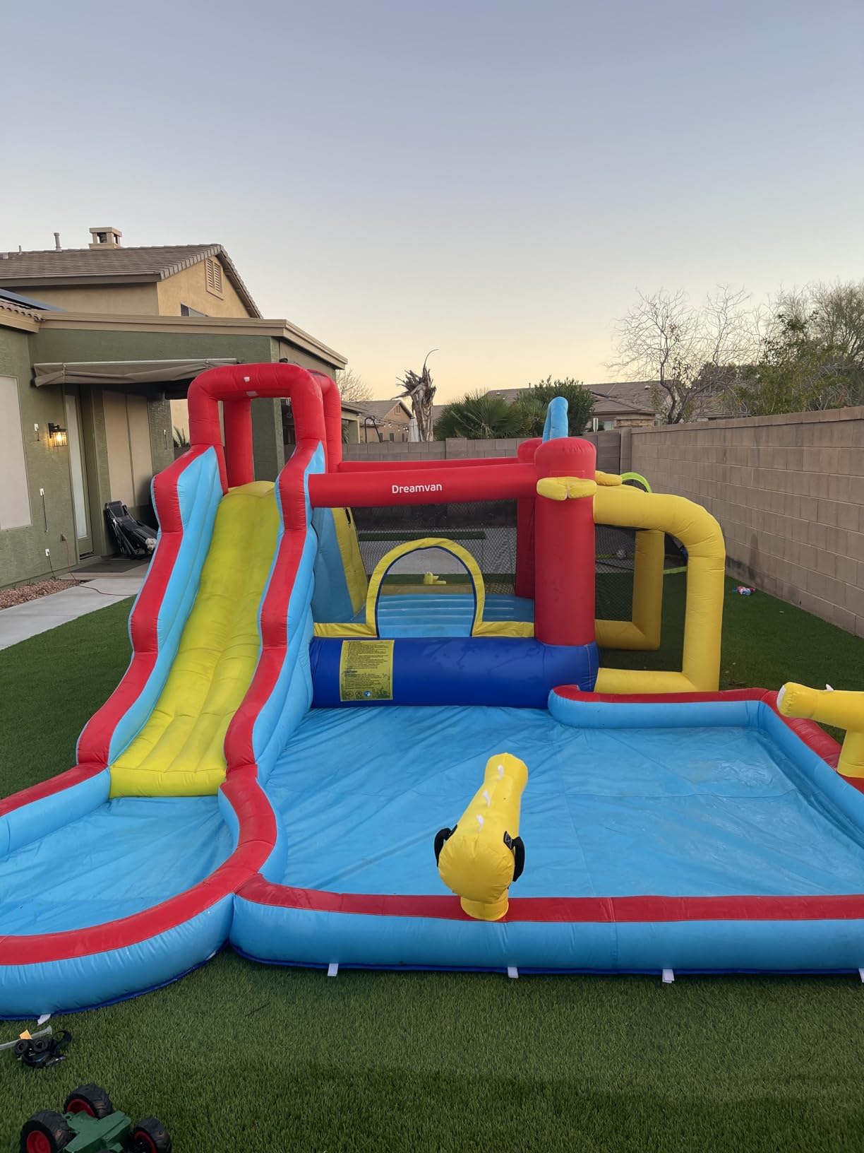 **AKEYDIY 13-in-1 Inflatable Water Slide Bounce House with Waterfall Waves - Kids Backyard Water Park, Splash & Blast Bouncer, Ball Toss, Soccer Gate | Perfect for Summer Parties, Birthdays, and Outdoor Family Fun**