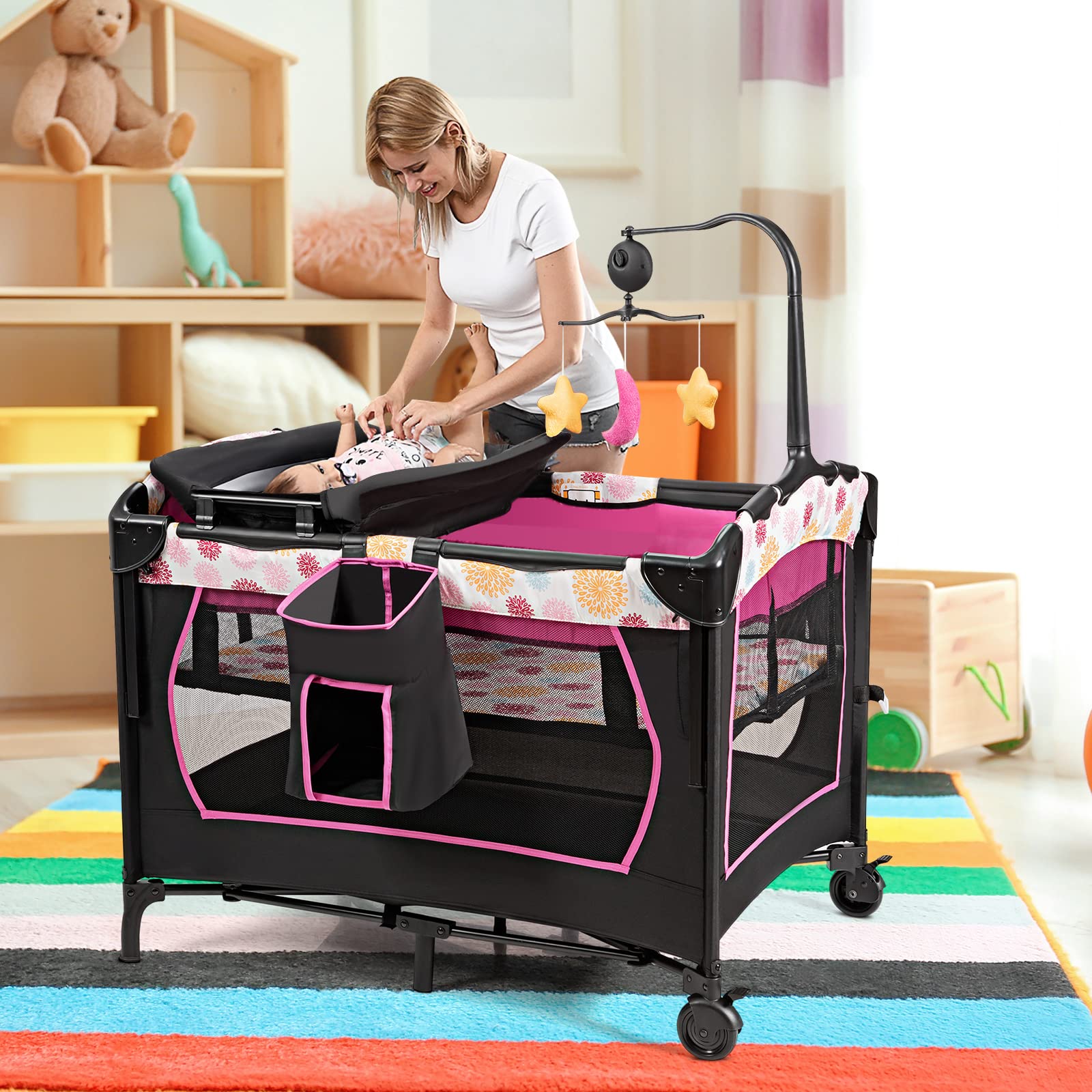 HONEY JOY 4-in-1 Portable Baby Playard with Bassinet, Diaper Changing Table, Storage Bag & Toy Rack | Bedside Sleeper with Music Box for Newborn to Toddlers | Nursery, Travel & Home Use (Rose)
