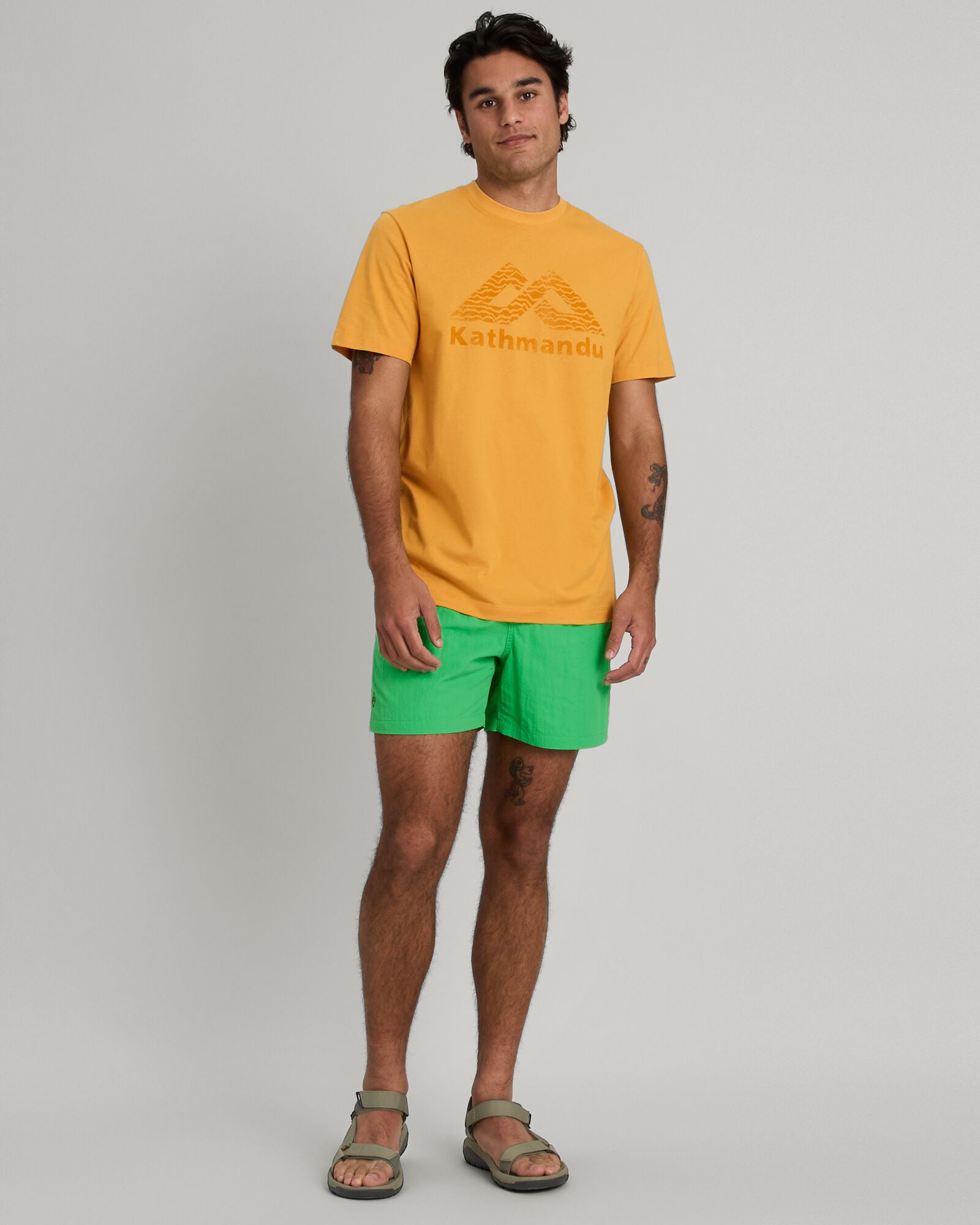Kathmandu Logo Men's Short Sleeve T-Shirt - Mustard Yellow Cotton Casual Tee for Outdoor Adventures & Streetwear Fashion