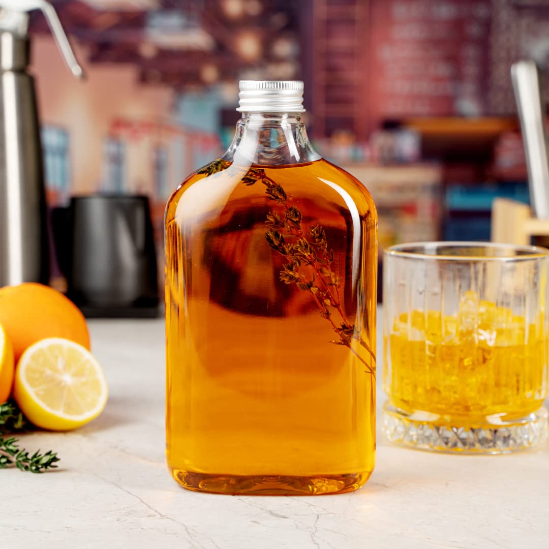 Restaurantware Bottle Tek 16.9oz Empty Plastic Liquor Bottles (100-Pack) - Clear Disposable Flask with Aluminum Lids for Juice, Ginger, Sauces & Party Favors | Perfect for Bars, Catering, Restaurants & Home Mixology