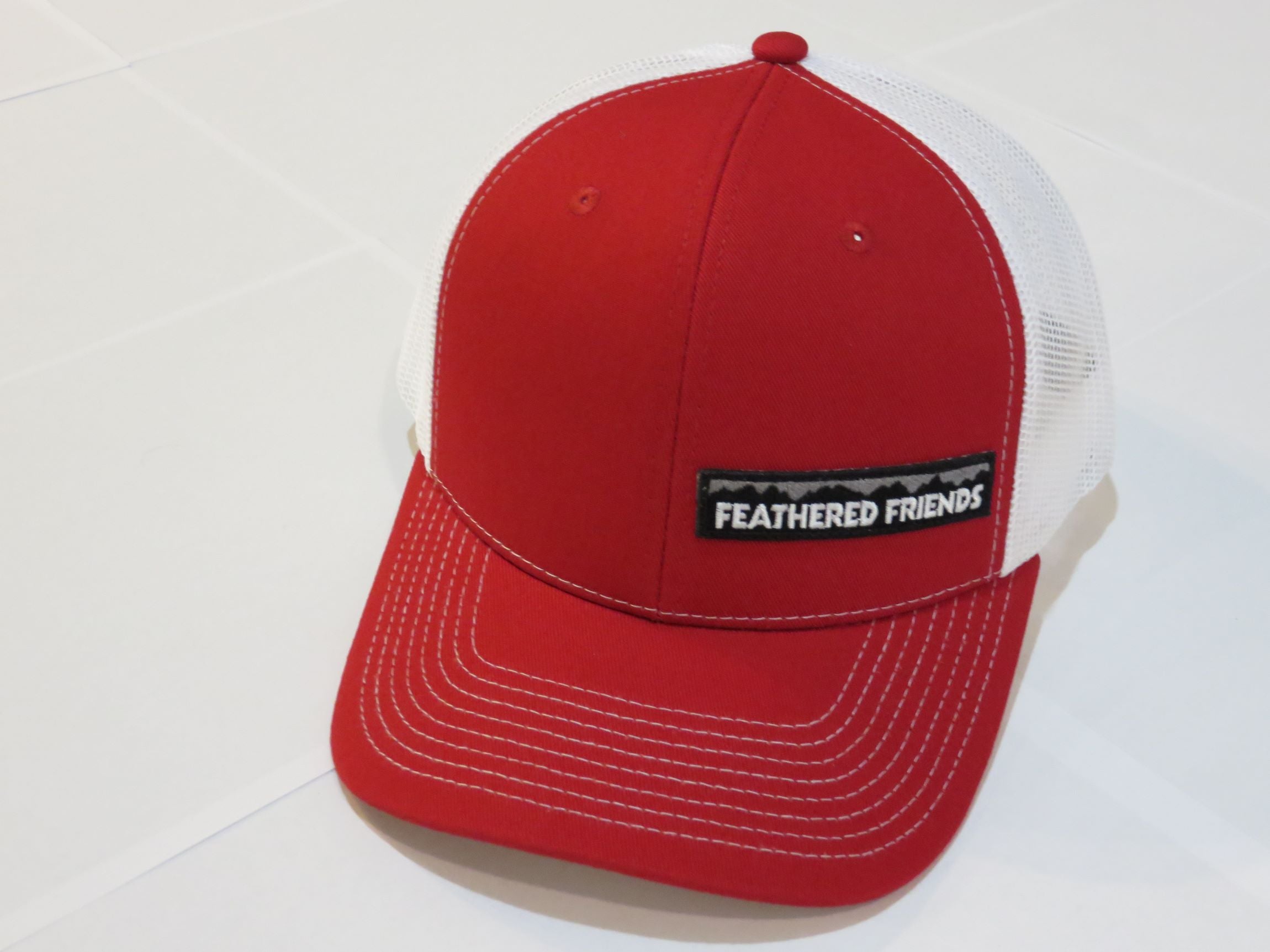 Feathered Friends Pro Style Trucker Offset Mountain Logo Patch Hat - Stylish Adjustable Cap for Outdoor Adventures, Hiking & Casual Wear