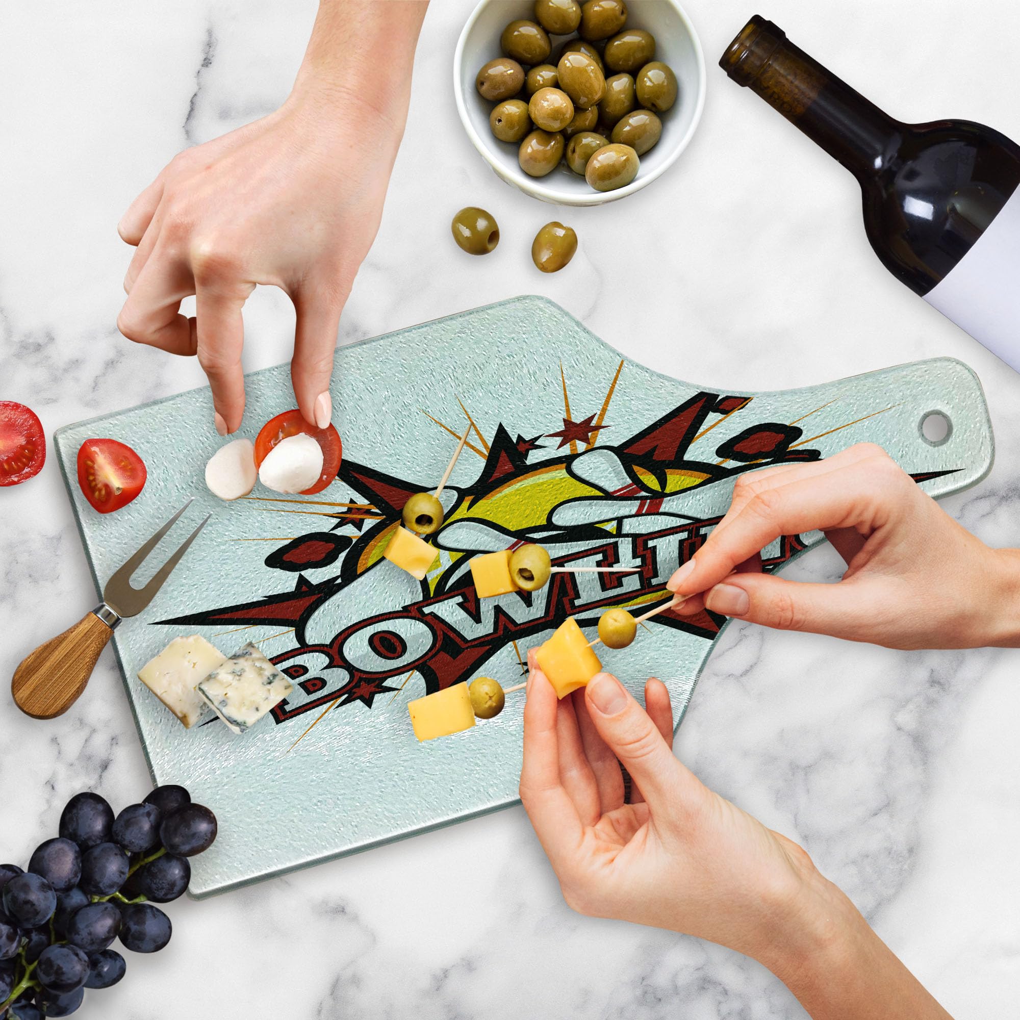 Ambesonne Bowling Party Themed Cartoon Comic Book Style Cutting Board - Retro Stars & Crash Effects Design - Tempered Glass Serving Board for Cheese, Charcuterie & Wine - Wine Bottle Shape in Ruby, White & Yellow - Perfect for Bowling Parties, Game Nights & Entertaining Guests