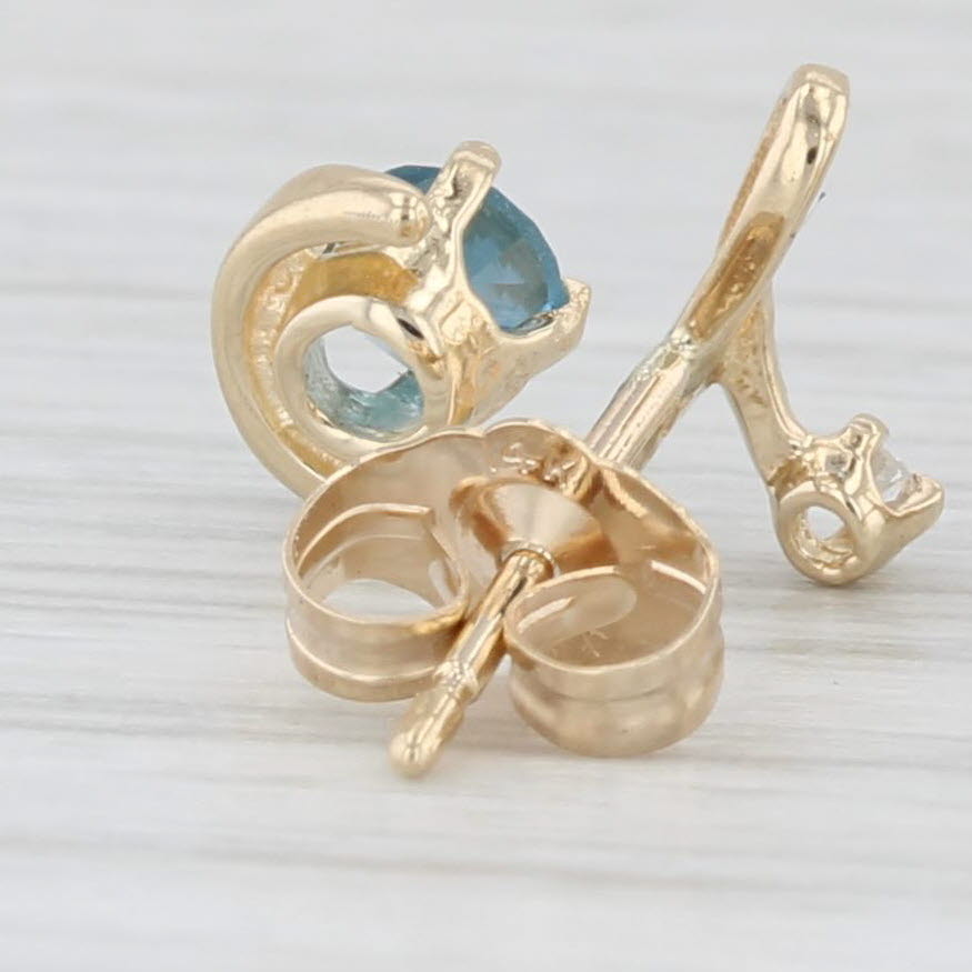 0.48ctw Blue Topaz & Diamond Swirl Stud Earrings in 14k Yellow Gold - Elegant Jewelry for Women, Perfect for Weddings, Parties & Special Occasions