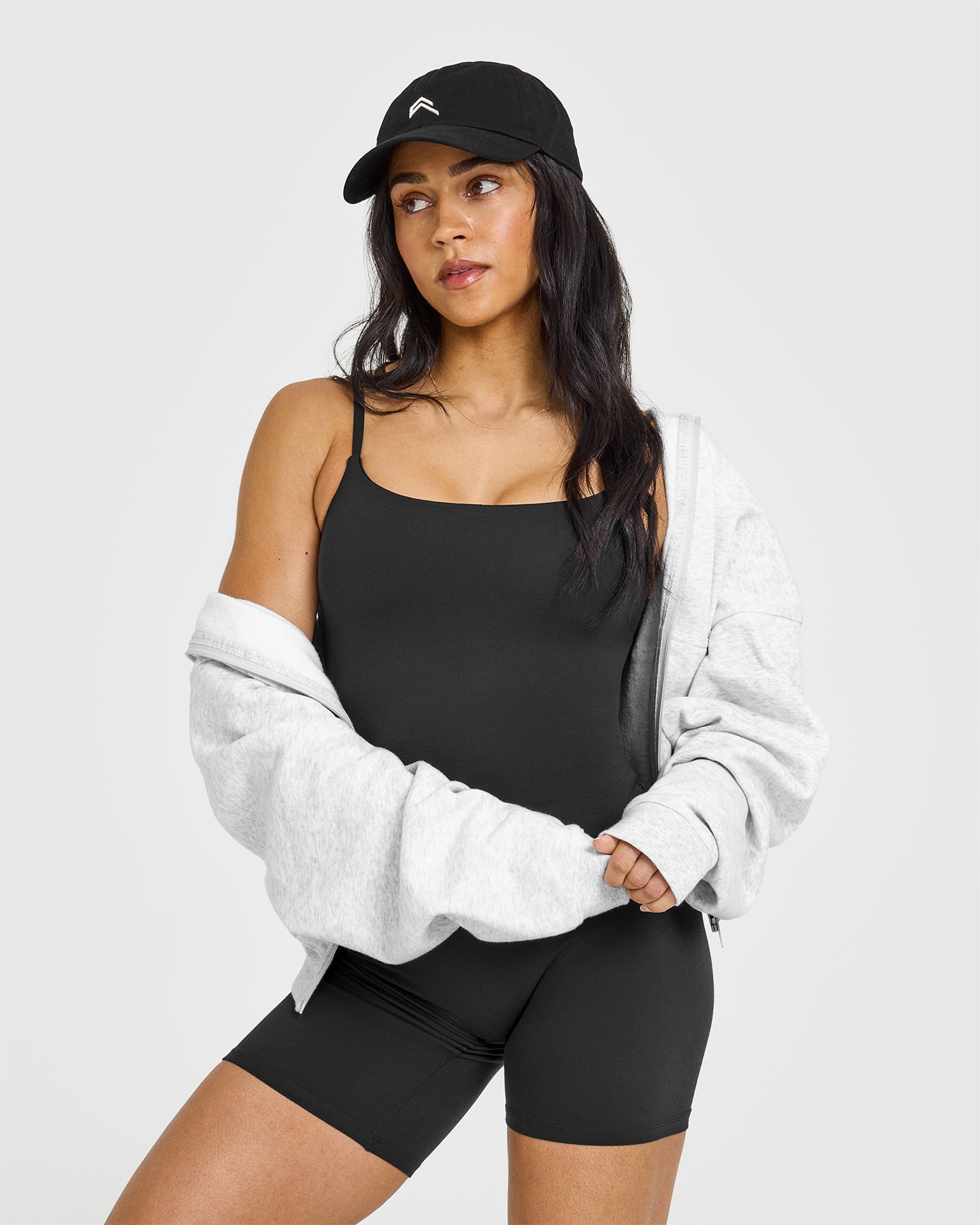 SoftMotion™ Strappy Vest with Built-in Bra Shelf | Soft Black | Comfortable Workout Top for Yoga, Running & Gym