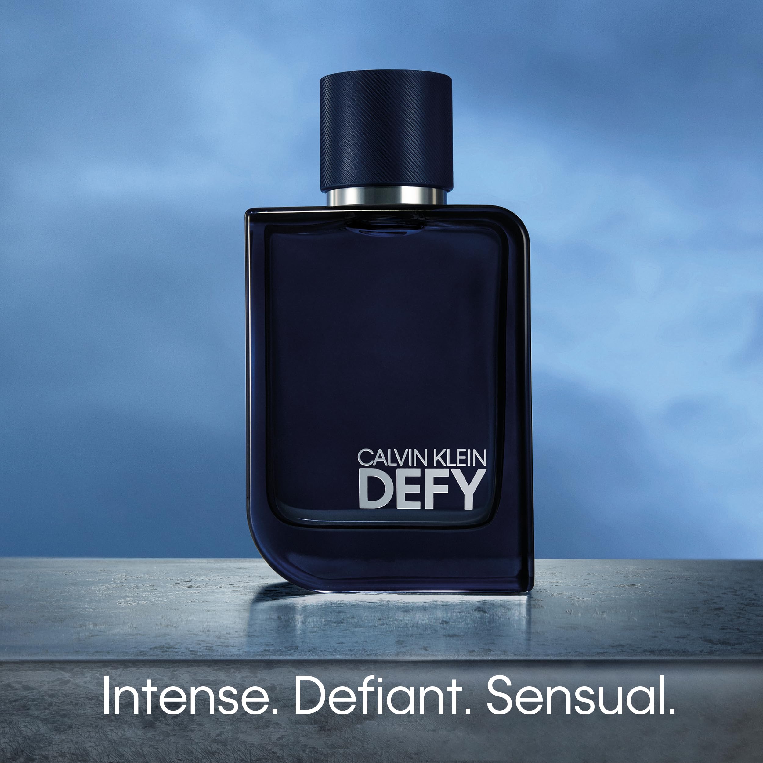 Calvin Klein Defy Parfum for Men - Woody Cologne with Mandarin Oil, Pink Pepper, Ginger & Sandalwood Notes - Long Lasting Luxury Fragrance - Perfect for Date Night, Office & Special Occasions