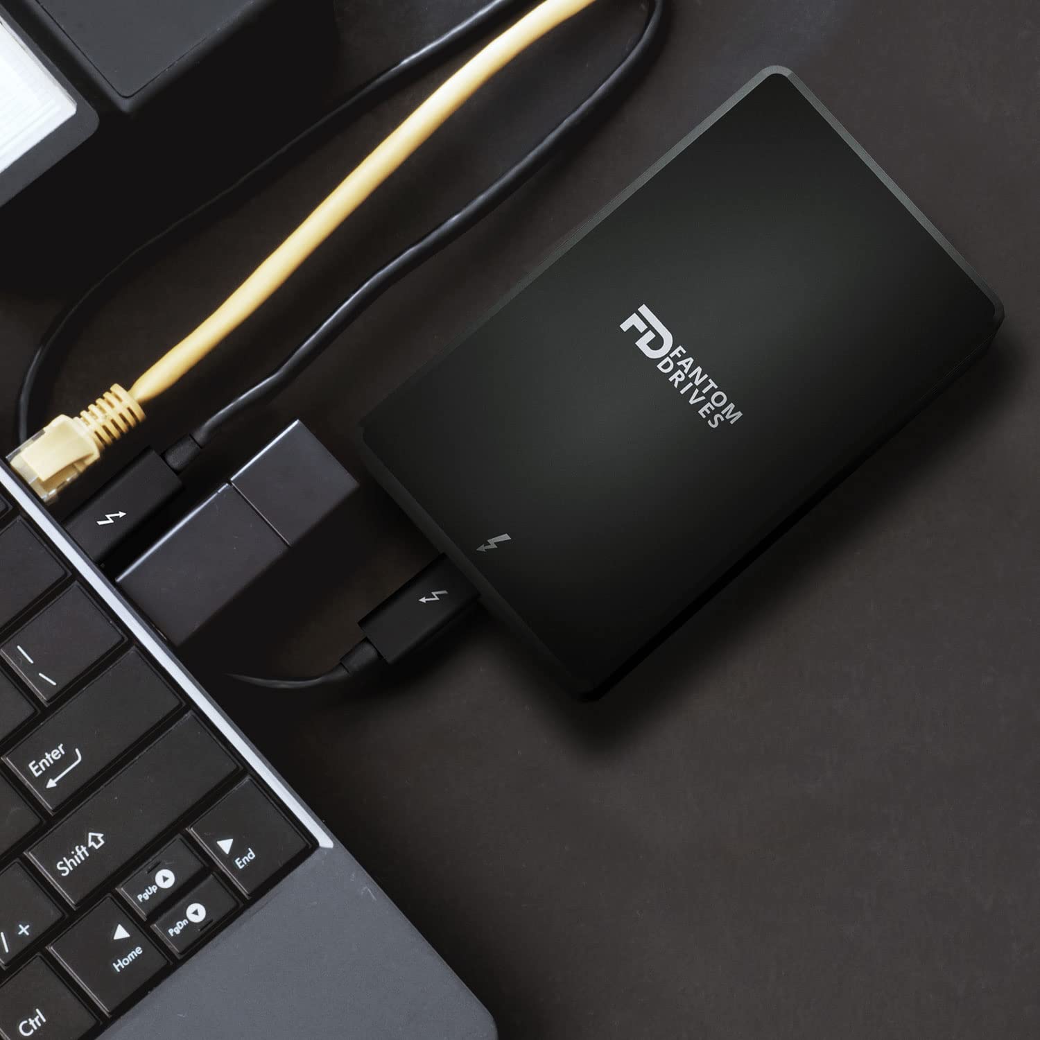 Fantom Drives 4TB Portable SSD - Thunderbolt 3/4 & USB 3.2 Type-C External Solid State Drive - 2800MB/s Speed - 3D NAND TLC Flash - Intel Certified (TB3X-2300N4TB) - Perfect for Gaming, Video Editing & Data Backup