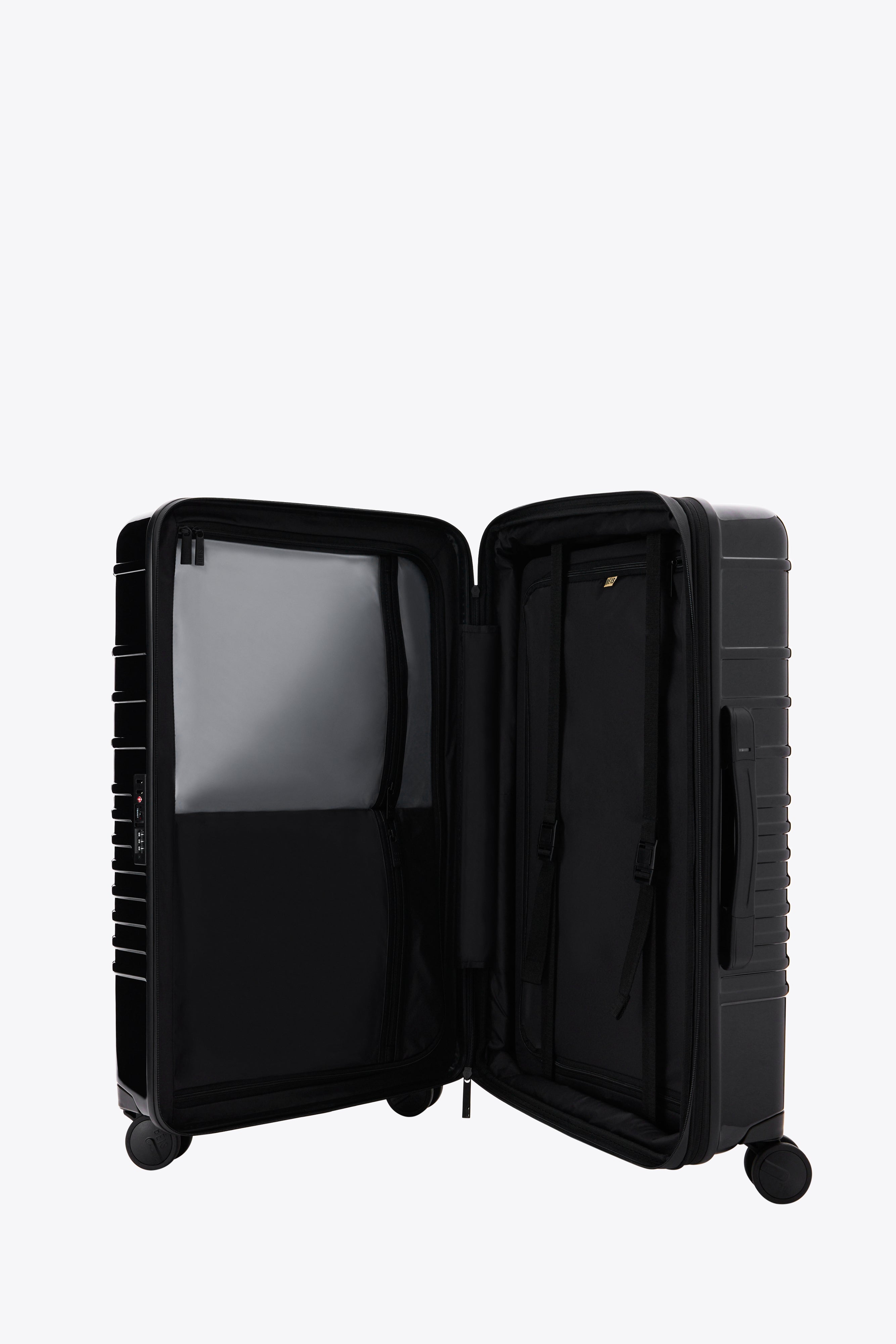 Glossy Black Medium Check-In Roller Luggage - Perfect for Business Travel & Weekend Getaways