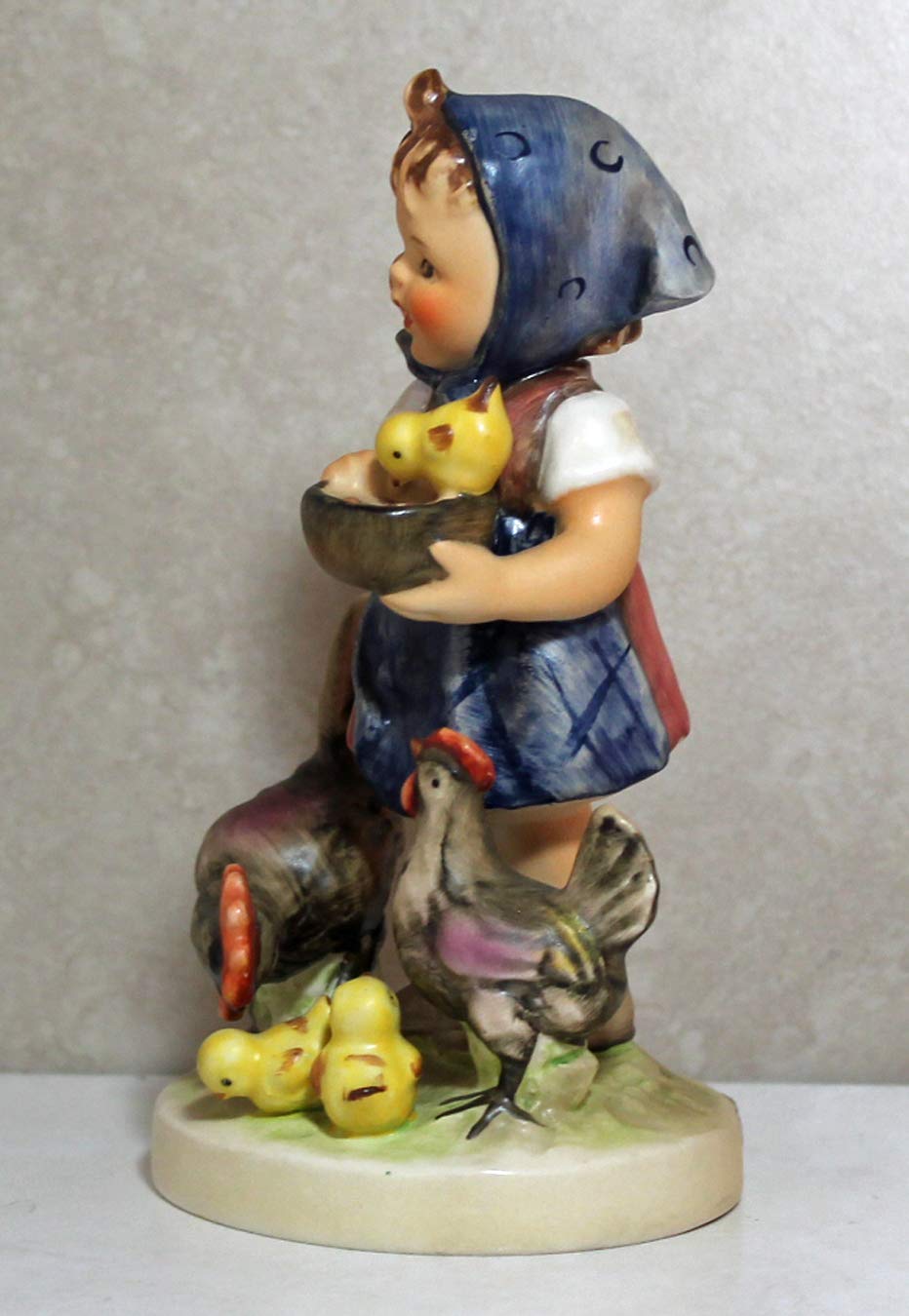 HUMMEL Feeding Time Figurine #199/I - 5.5 Inch Tall Collectible Porcelain Statue | Perfect for Kitchen Decor, Gift for Collectors & Home Display