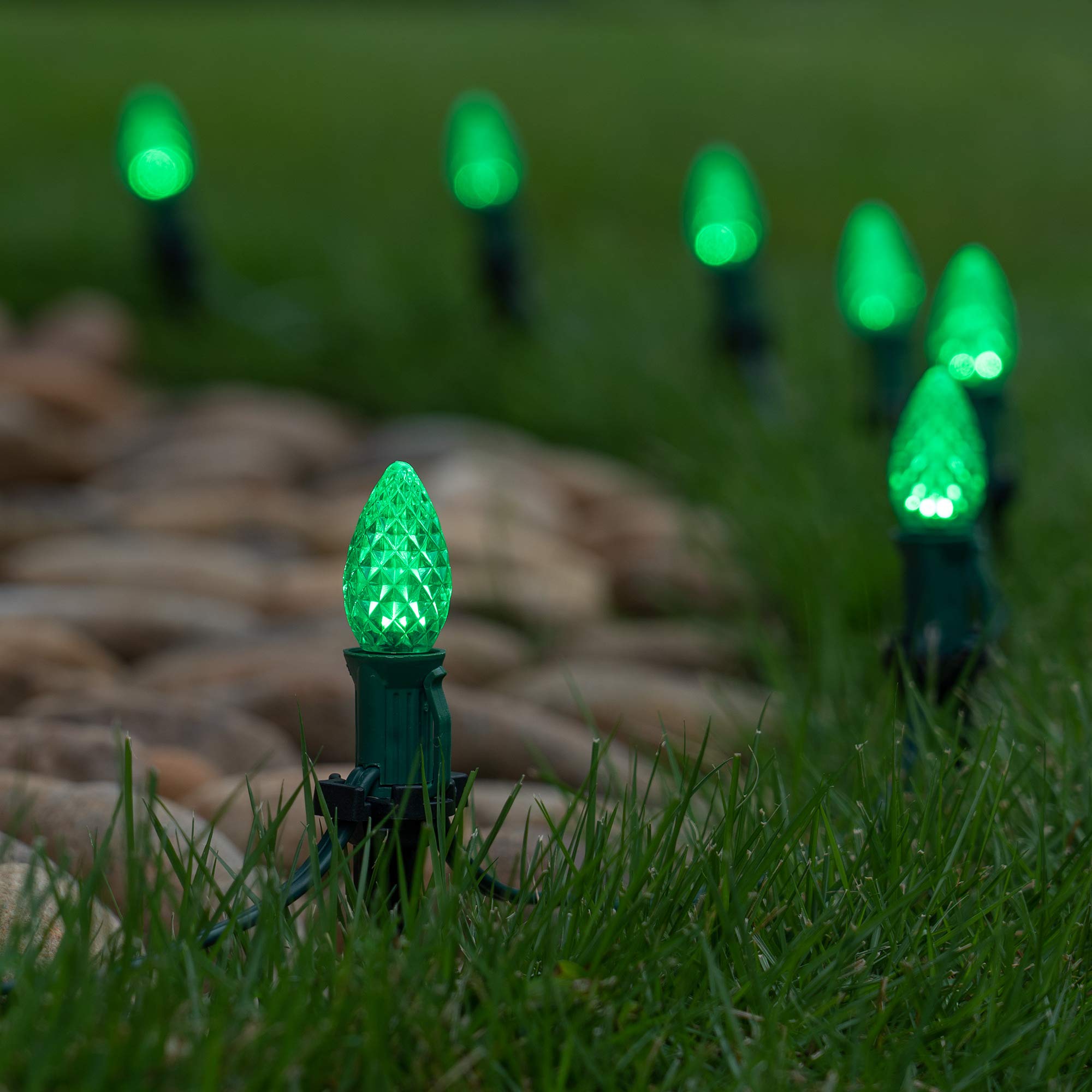 50’ OptiCore LED C7 Green Christmas Pathway Lights - Outdoor Driveway & Walkway Decoration with 4.5” Stakes, Green Wire Plug String Lights - Perfect for Holiday Yard, Garden & Landscape Lighting