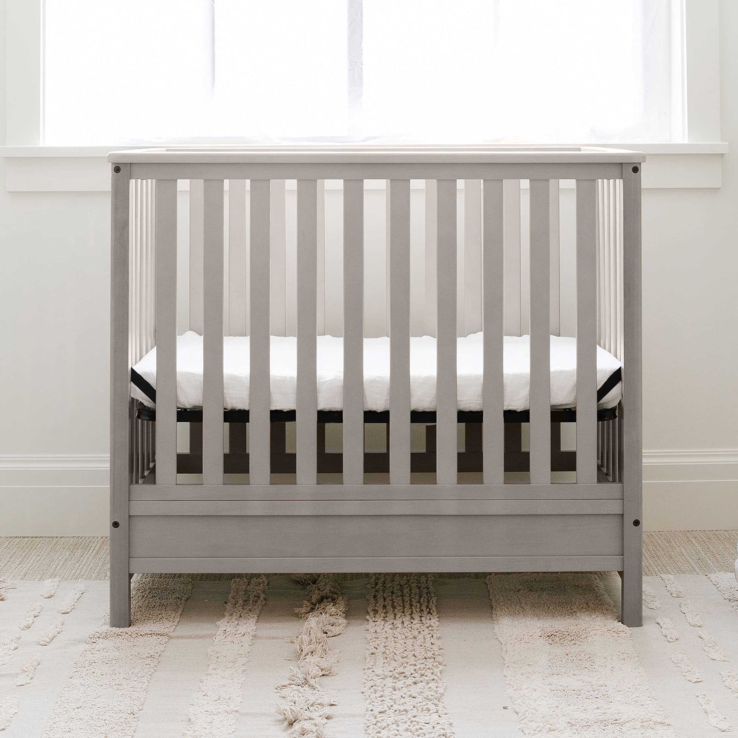 Storkcraft 5-in-1 Convertible Mini Crib with Bonus 2.75