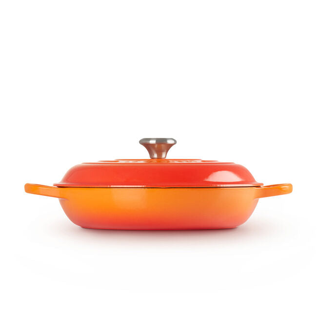 Le Creuset 4.7 Quart Enameled Cast Iron Braiser with Lid - Flame Color - Perfect for Braising, Roasting & Searing - Ideal for Stovetop, Oven & Table Serving