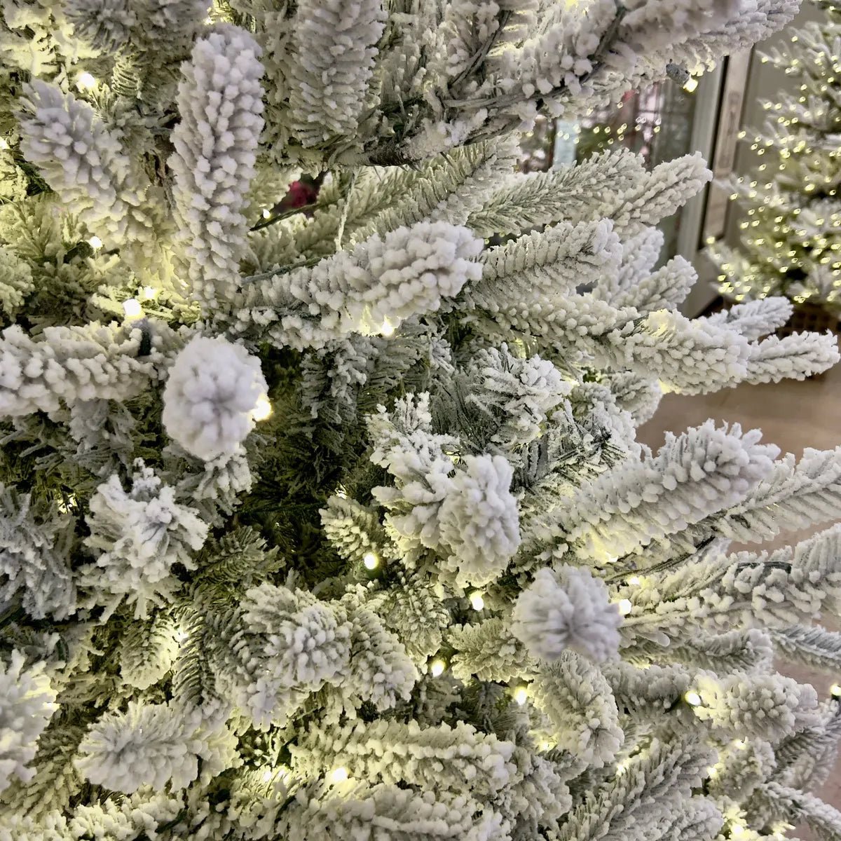 7.5 Foot Pre-Lit Flocked Balsam Fir Christmas Tree with 500 Warm White LED Lights - Perfect for Holiday Home Decor & Festive Celebrations