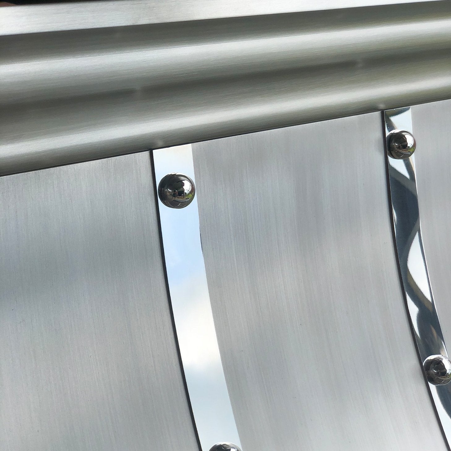 Custom Stainless Steel Curved Range Hood with Bands - RHM H3 C 2STRM Model | Professional Kitchen Ventilation for Home Chefs | Perfect for Modern Kitchens & Open-Concept Homes