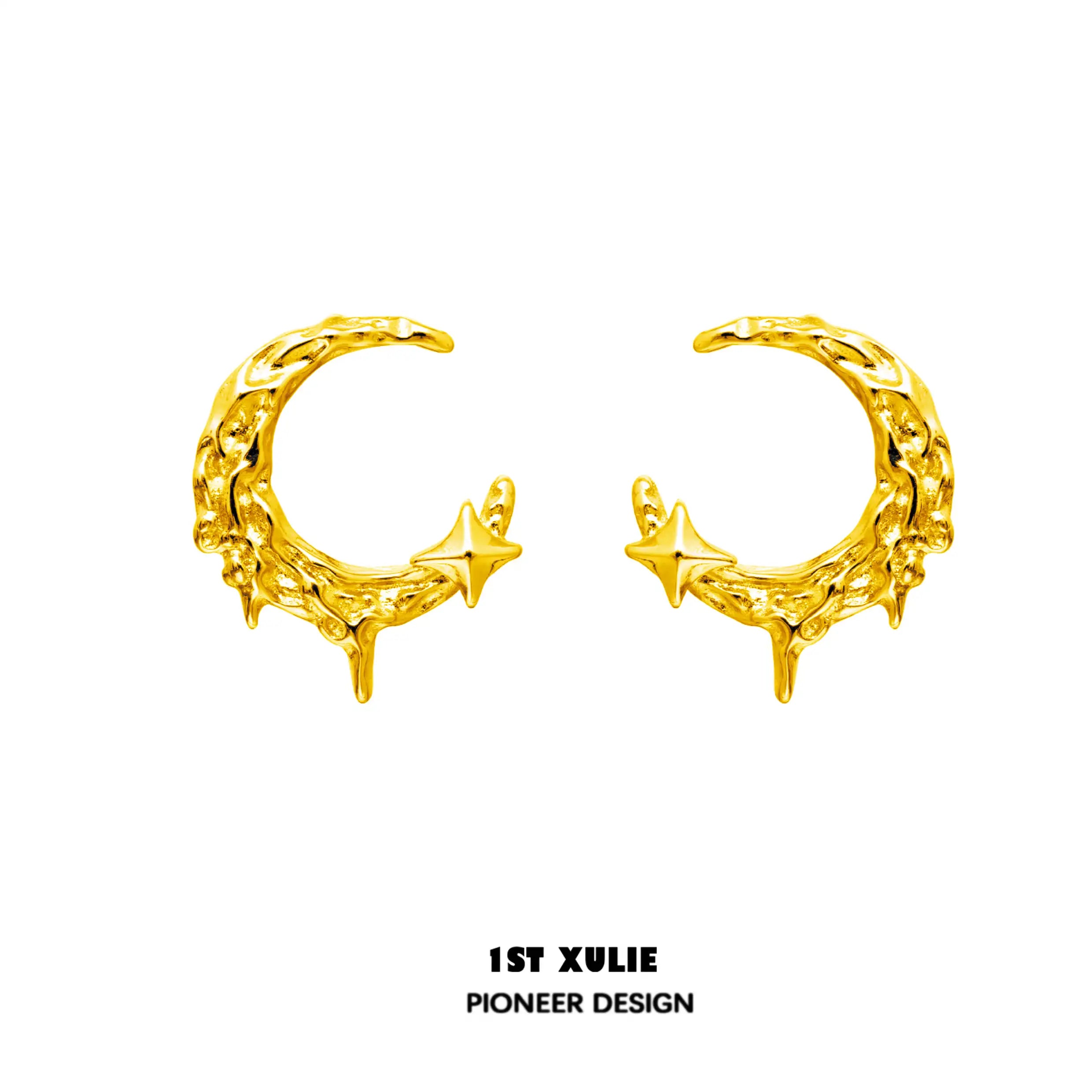 A pair of gold earrings