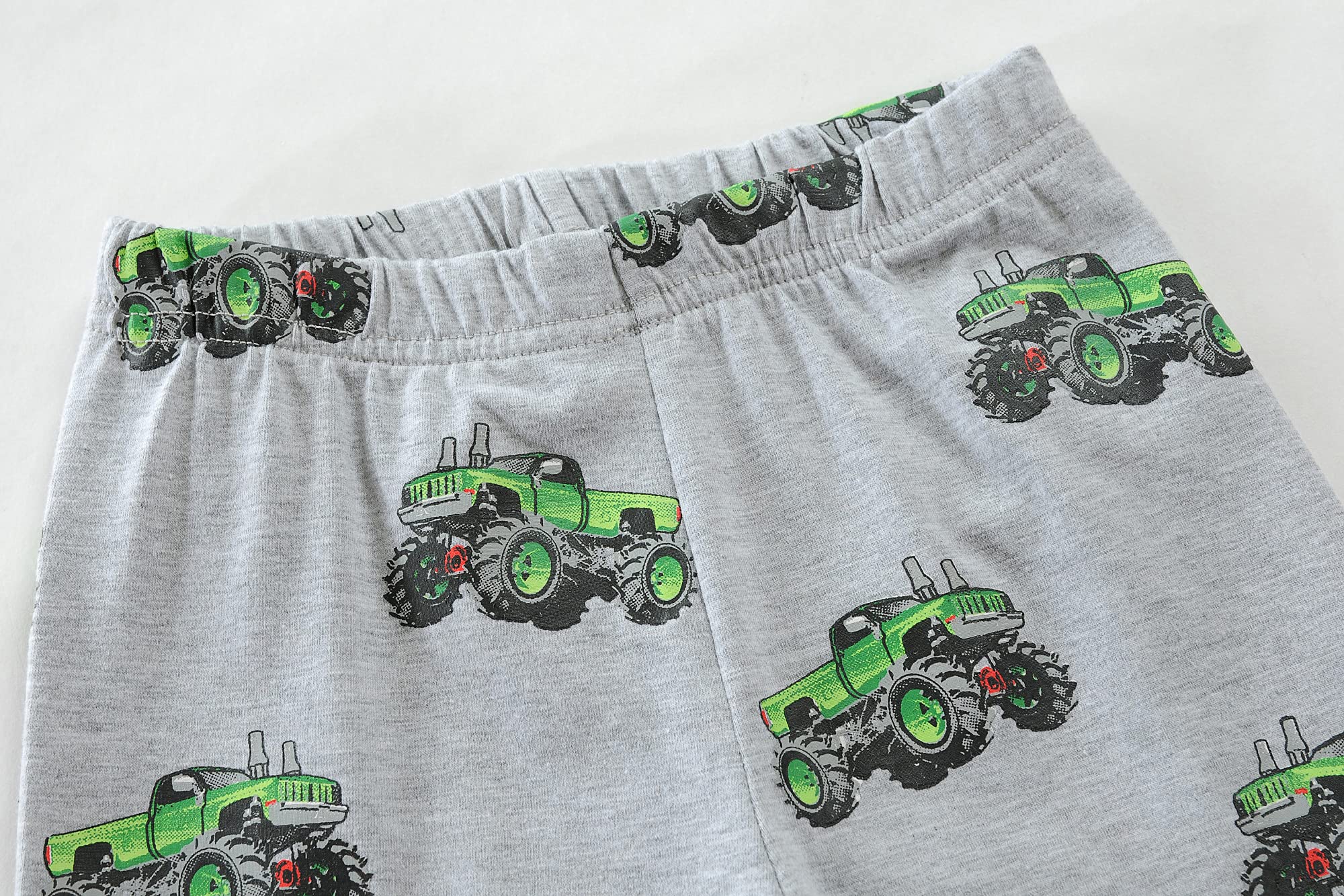 Boys' 2-Piece Cotton Pajama Set with Monster Truck & Dinosaur Print - Soft Sleepwear for Toddlers Ages 2-7 Years | Perfect for Bedtime & Lounging