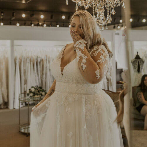 Elegant Plus Size Long Sleeve Lace Wedding Dress with V-Neck A-Line Silhouette | UK Bridal Gown for Church, Beach, and Garden Weddings