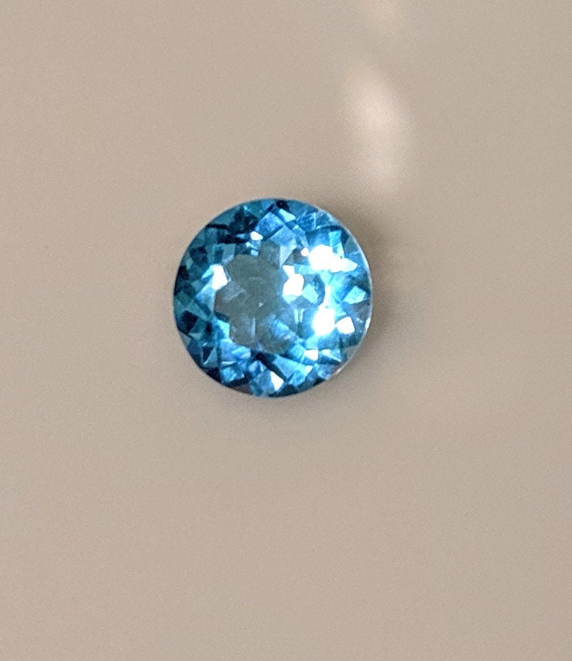 1.5ct Natural African Swiss Blue Topaz Loose Stone - 7mm Round, VVS Eye Clean, Exceptional Color & Clarity - Wholesale Gemstone for Jewelry Making, Engagement Rings & Unique Gifts