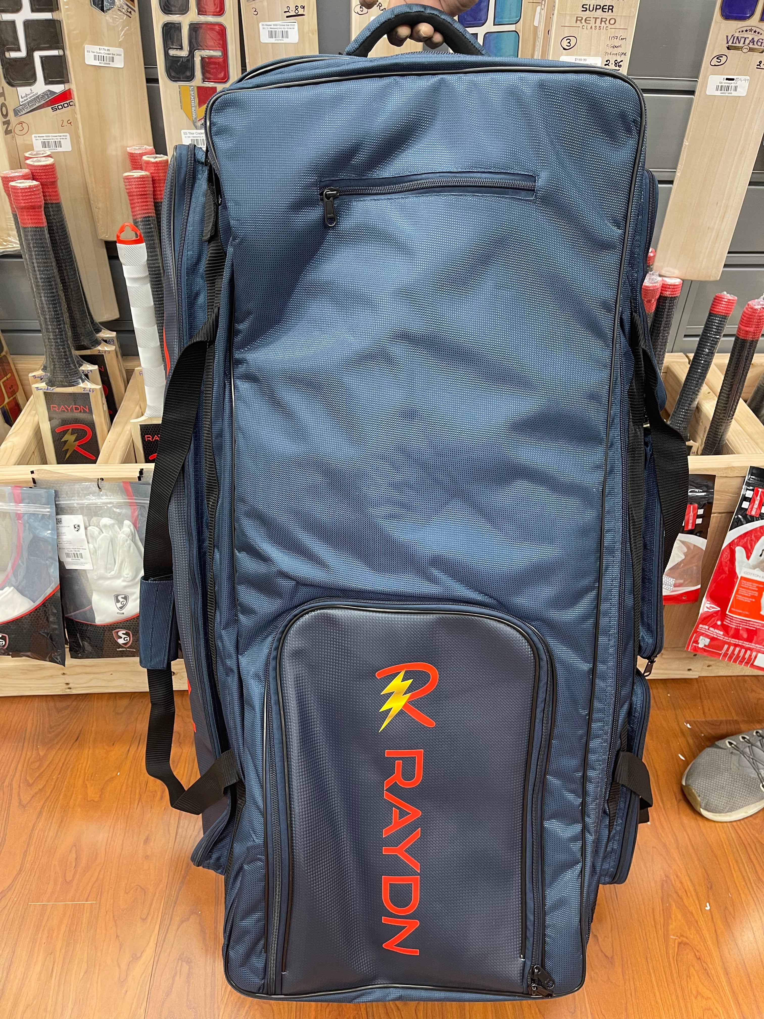 Raydn Professional Wheelie Premium Adult Cricket Kit Bag - Navy Blue & Black - Durable Cricket Equipment for Training & Matches - Perfect for Cricket Players & Enthusiasts