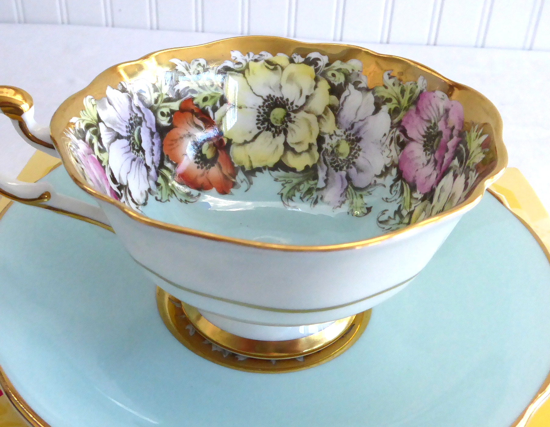 Vintage Paragon Cup and Saucer Set - Luxe Gold Trim with Aqua Poppies Design, Queen Elizabeth Warrant 1950s - Perfect for Afternoon Tea, Collectible China Display, and British Royalty Memorabilia