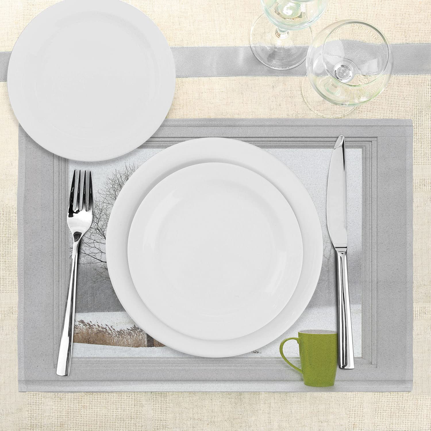 Ambesonne Winter Place Mats Set of 4 - Green Teacup on Windowsill Forest Snowstorm Scenic Countryside Design, Washable Fabric Dining Table Mats for Kitchen & Dining Room Decor in Apple Green, Beige & White - Perfect for Holiday Dinners, Cozy Winter Meals & Seasonal Home Decor