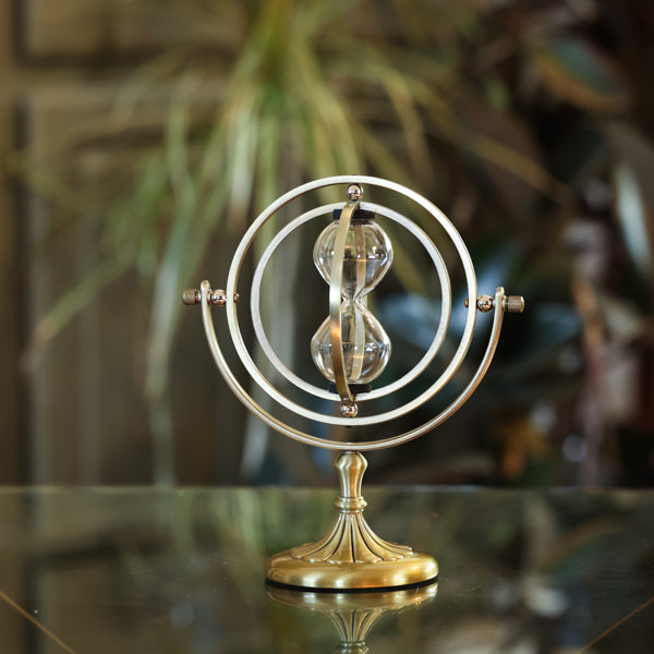 Elegant Bronze Rotating Hourglass Urn - Timeless Decorative Piece for Home, Office, or Memorial Display