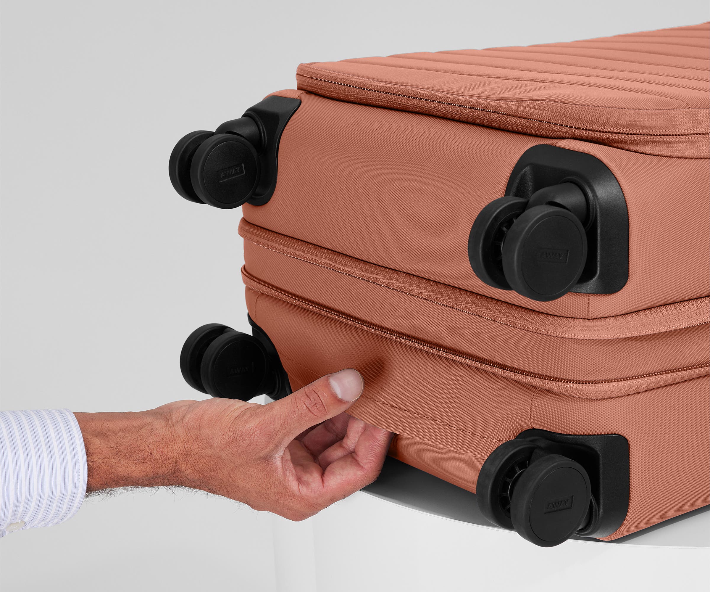 Softside Bigger Carry On Luggage in Clay Pink - Lightweight Spinner Suitcase for Women & Men, Perfect for Air Travel & Weekend Getaways