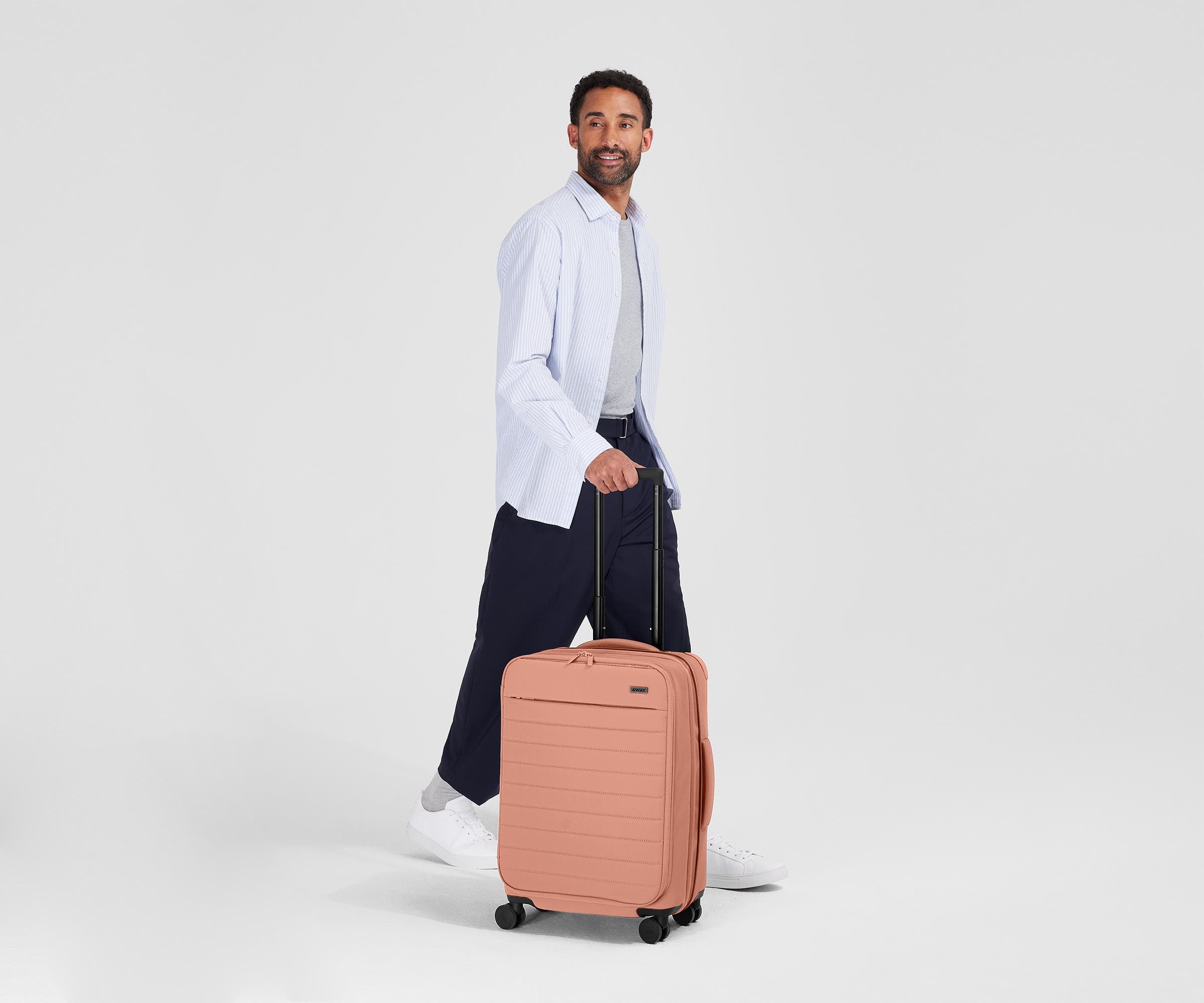 Softside Bigger Carry On Luggage in Clay Pink - Lightweight Spinner Suitcase for Women & Men, Perfect for Air Travel & Weekend Getaways