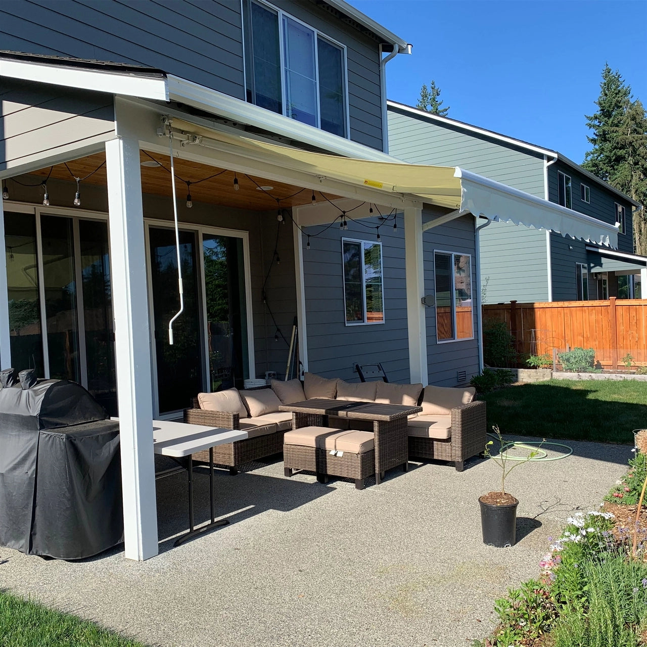 Aleko 10x8 Feet Motorized Retractable Patio Awning with White Frame in Ivory - Perfect for Outdoor Shade, Backyard Relaxation, and Deck Protection