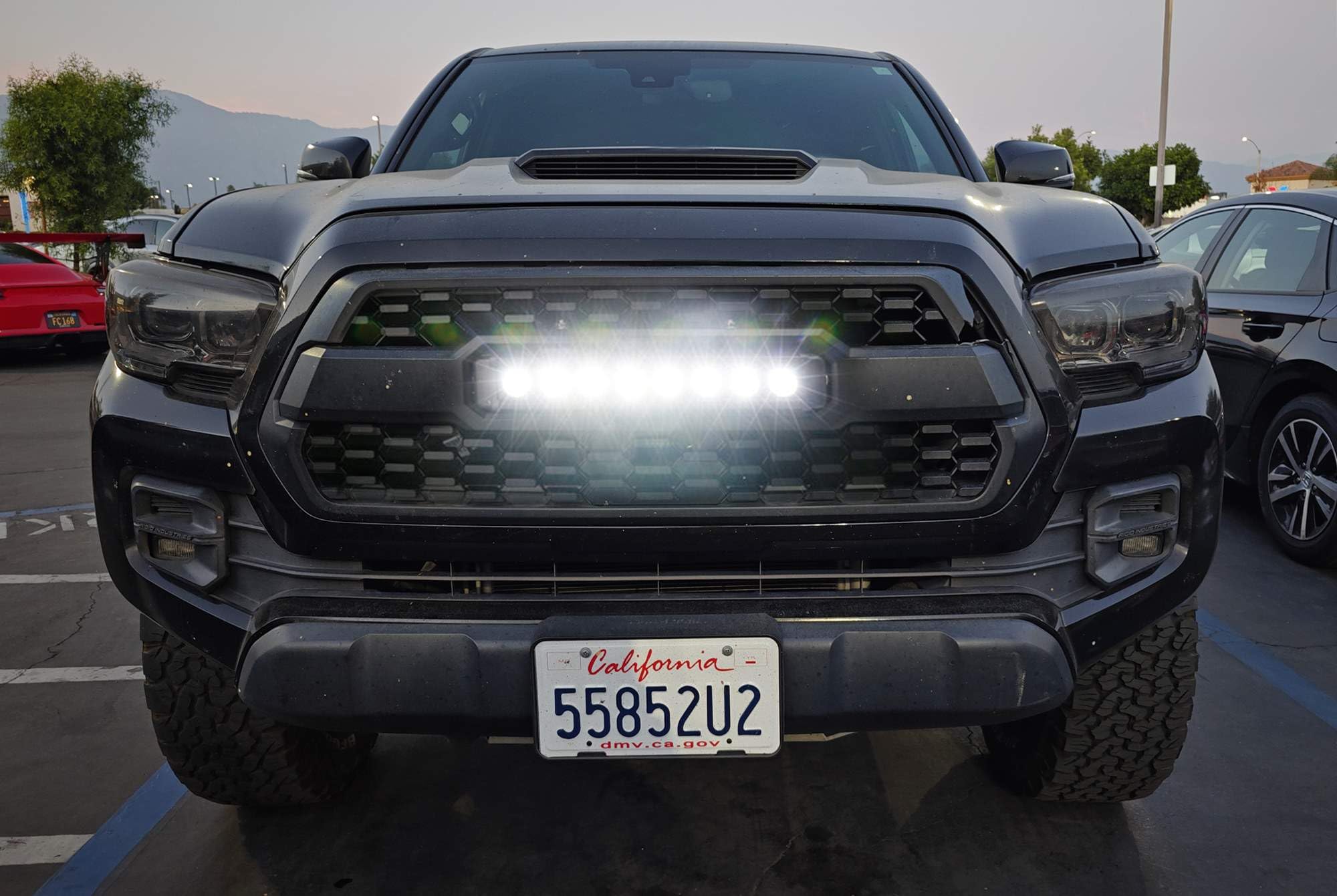 iJDMTOY 80W LED Light Bar Kit for 2016-2023 Toyota Tacoma - High Power Off-Road Lighting with TRD Grill Mount Brackets & Wiring Harness - Perfect for Night Driving, Camping, and Off-Road Adventures
