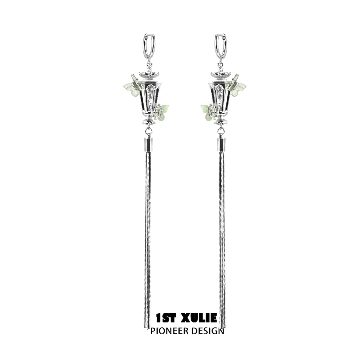 A pair of green butterfly earrings