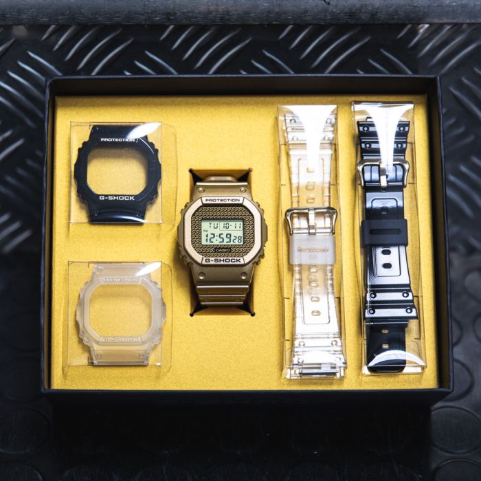 G Shock DWE5600HG 1D Gold Chain Digital Watch with Interchangeable Cases - Stylish Unisex Timepiece for Outdoor Sports & Everyday Wear
