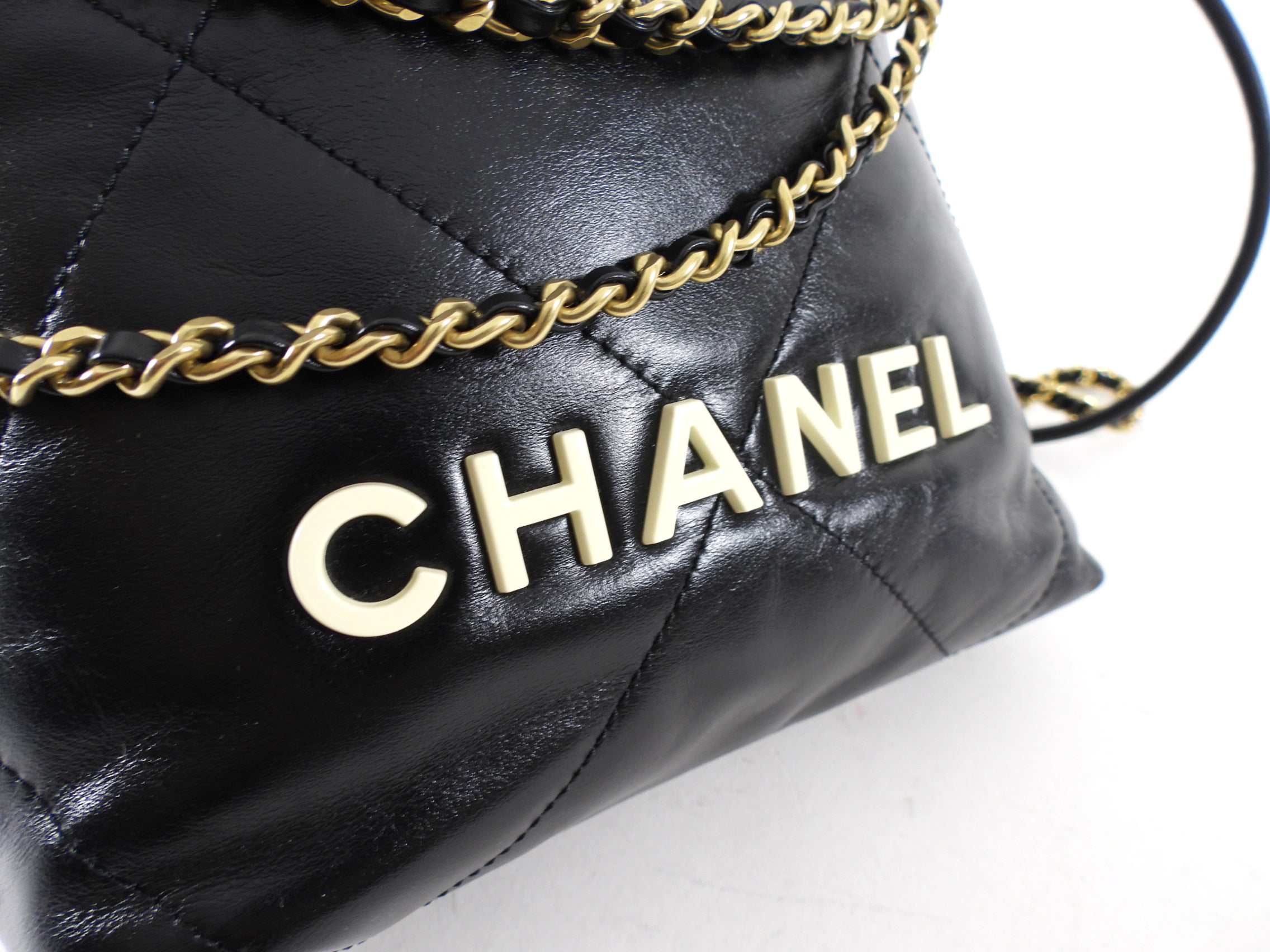 Chanel 2023 Black Leather Chain 22 Mini Bag with Ivory Enamel Logo - Luxury Designer Handbag for Women, Perfect for Evening Parties & Date Nights