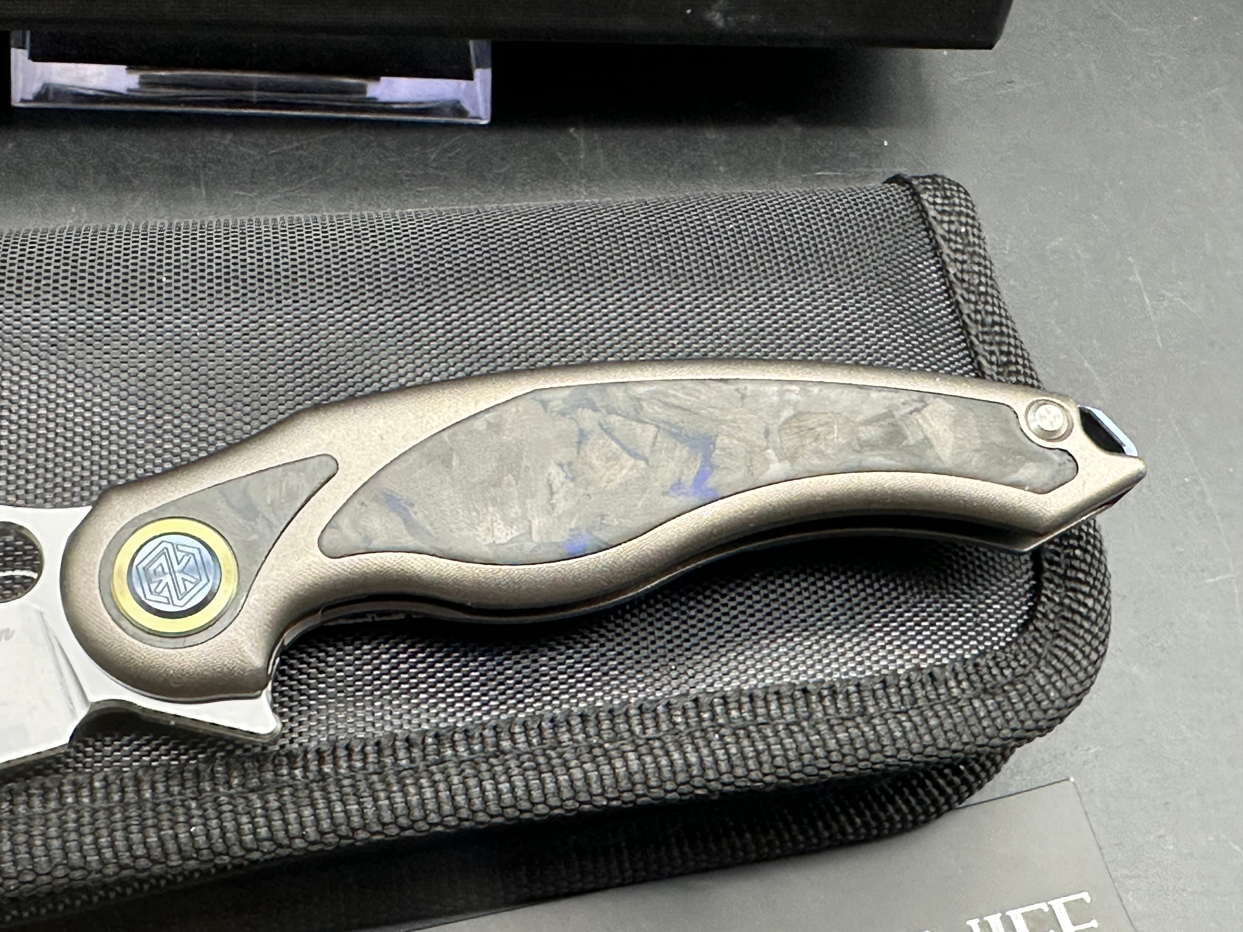 Rike Knives Unicorn Folding Pocket Knife - M390 Steel Blade, Black/Blue Carbon Fiber Handle - EDC, Outdoor, Camping, Hunting, Survival Gear