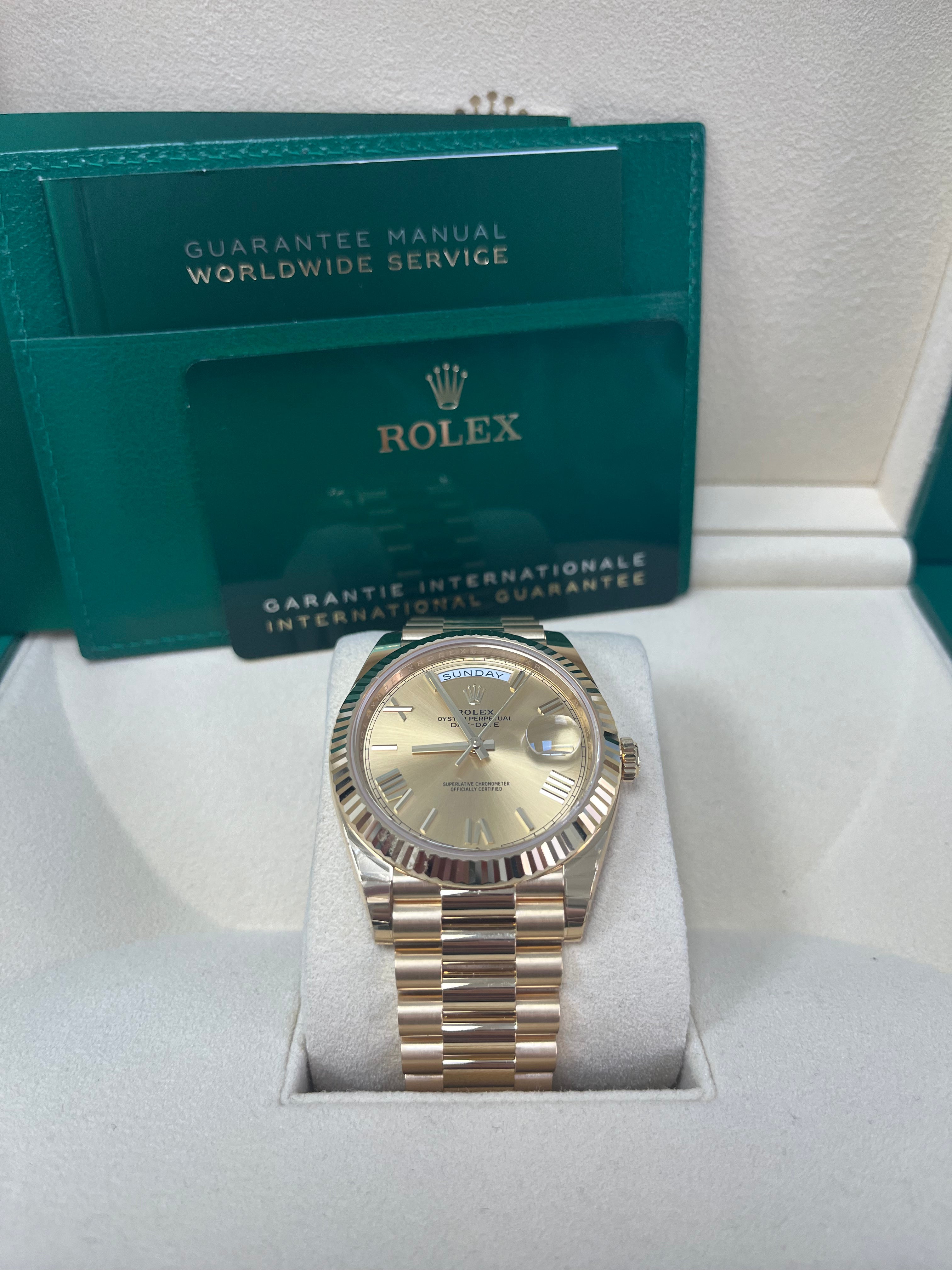 Rolex Day Date 40mm 18K Yellow Gold Men's Watch with Champagne Roman Dial & Fluted Bezel (Ref #228238) - Luxury Dress Watch for Business & Formal Occasions